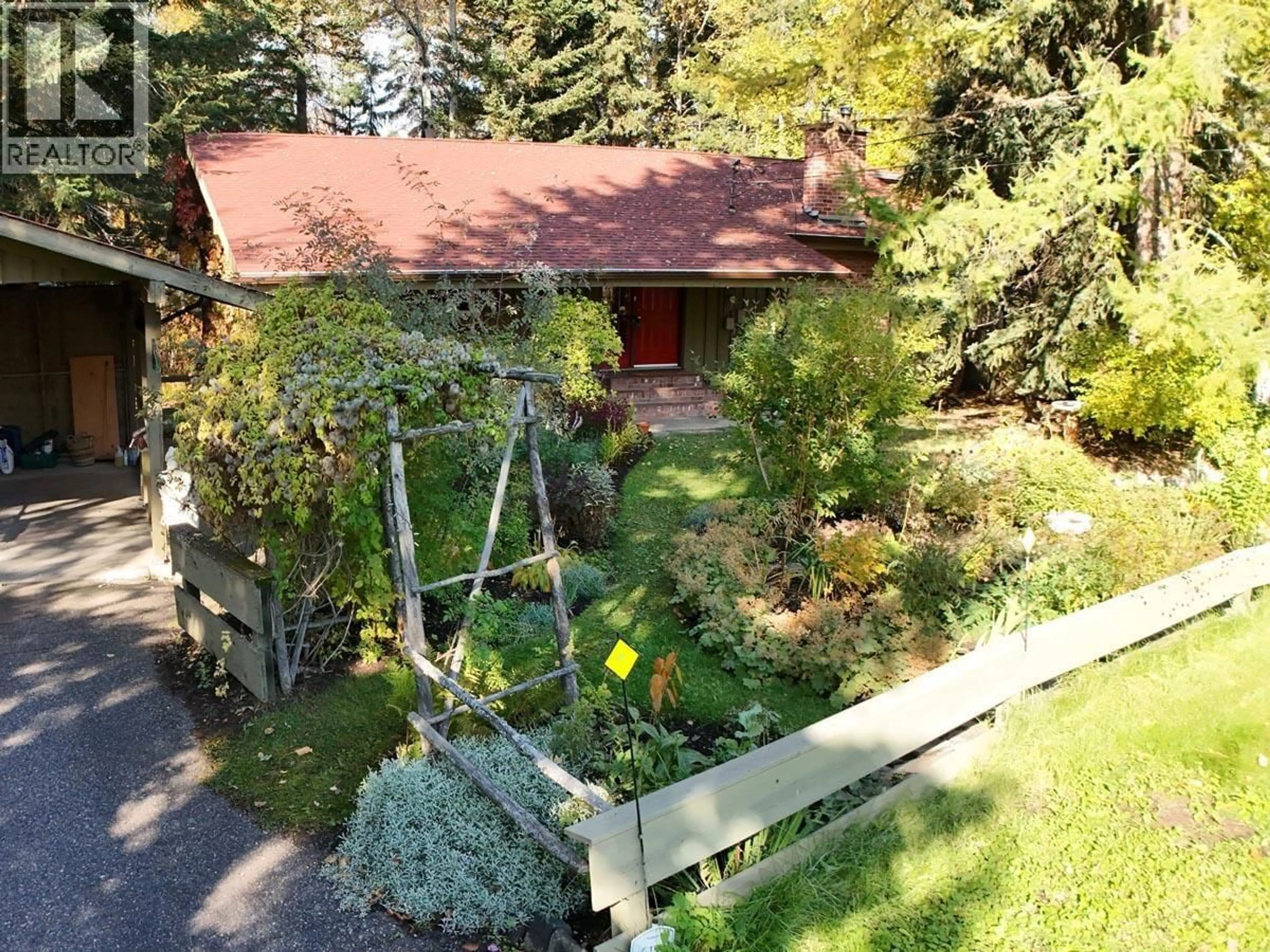 A pic from outside/outdoor area/front of a property/back of a property/a pic from drone, forest/trees view for 4147 SPECA STREET, Prince George British Columbia V2N5L7
