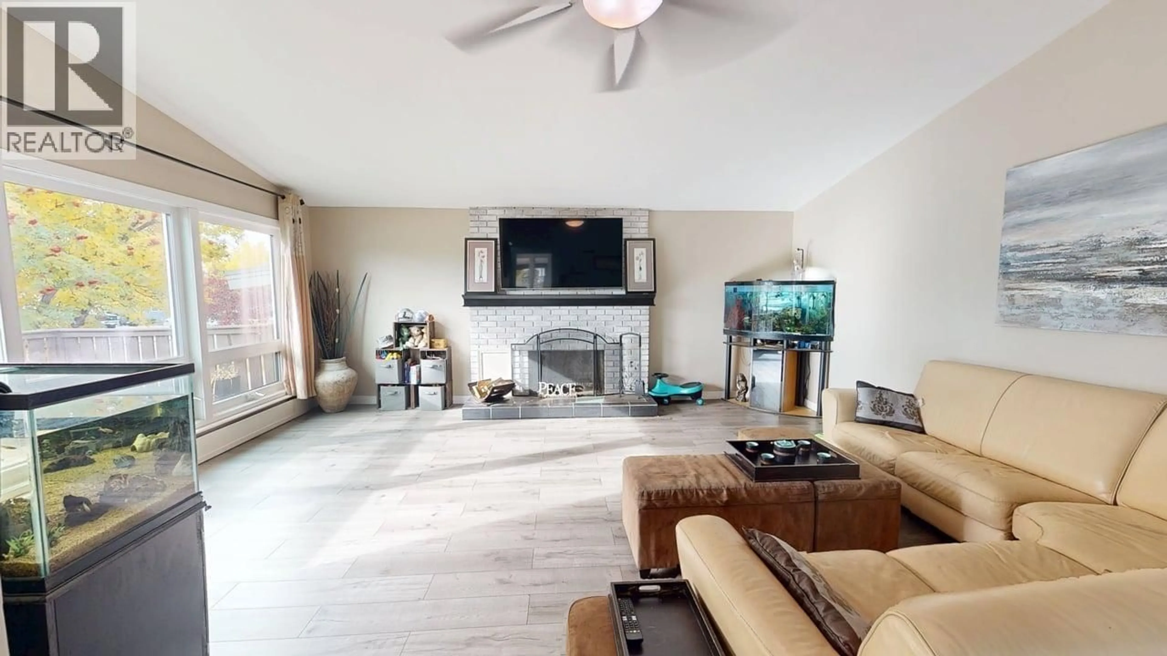 Living room with furniture, unknown for 9308 112 AVENUE, Fort St. John British Columbia V1J2V9