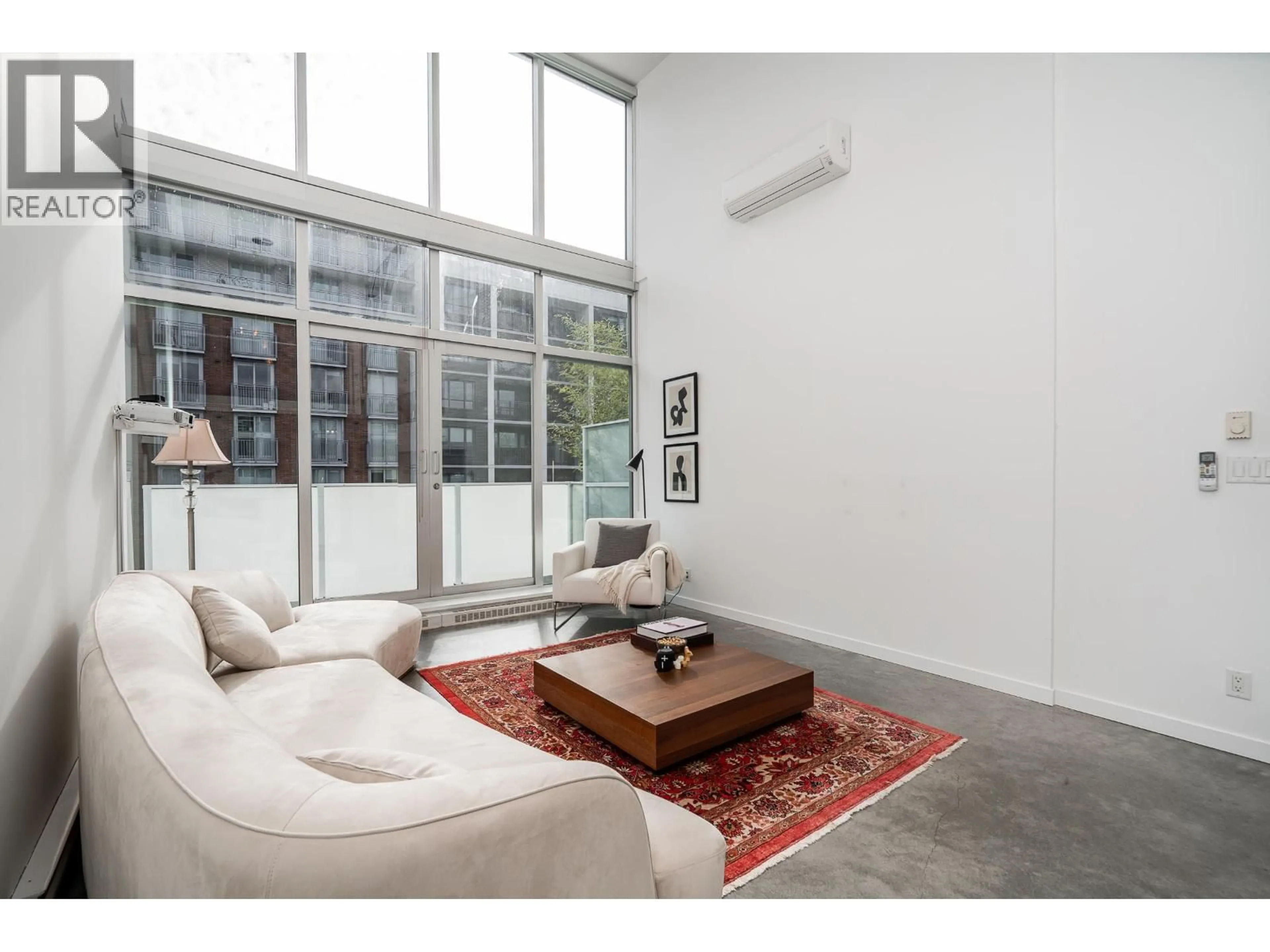 Living room with furniture, cement floor for PH609 - 53 HASTINGS STREET, Vancouver British Columbia V6B1G4