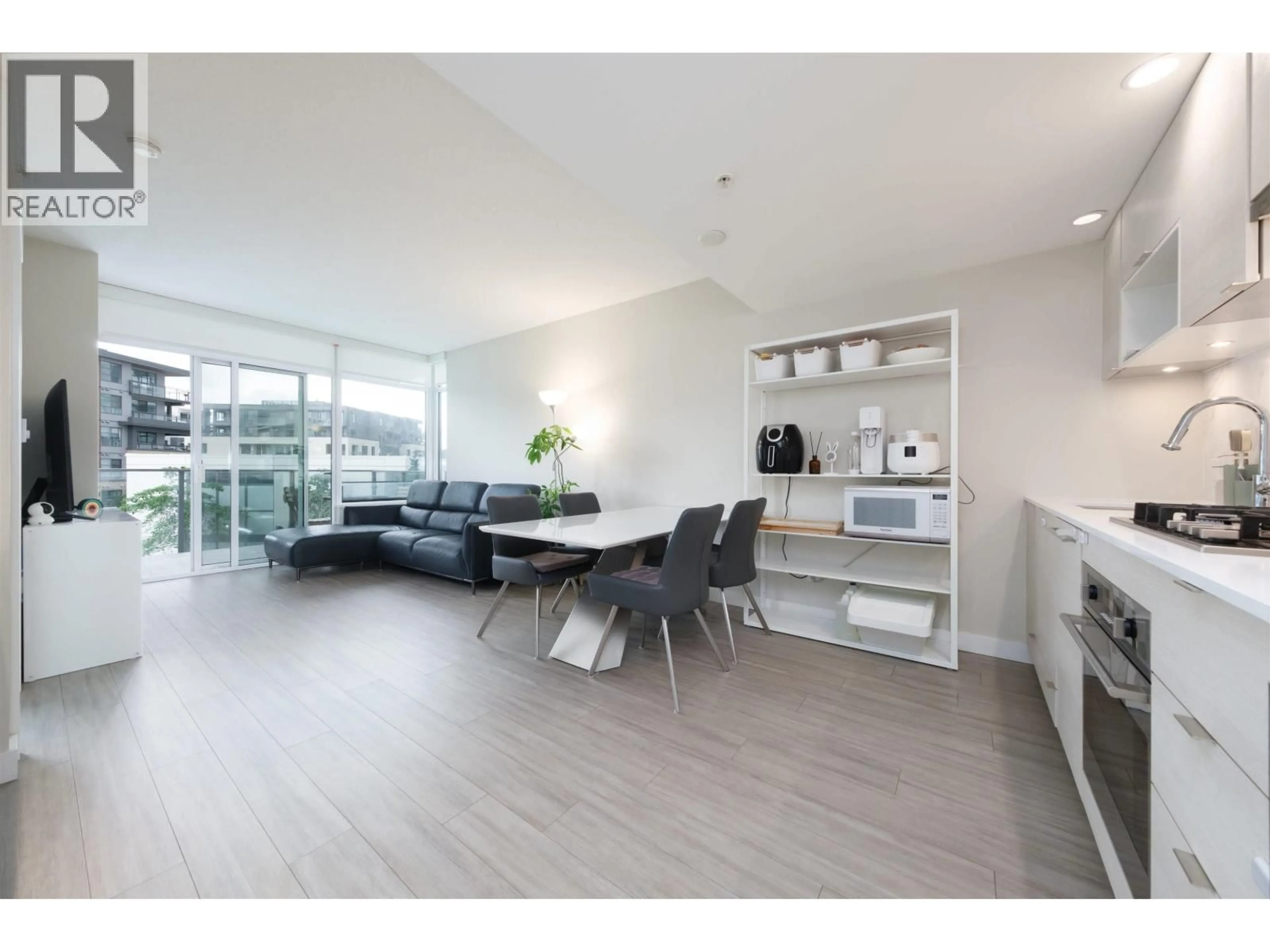 Living room with furniture, unknown for 306 - 602 COMO LAKE AVENUE, Coquitlam British Columbia V3J0G2