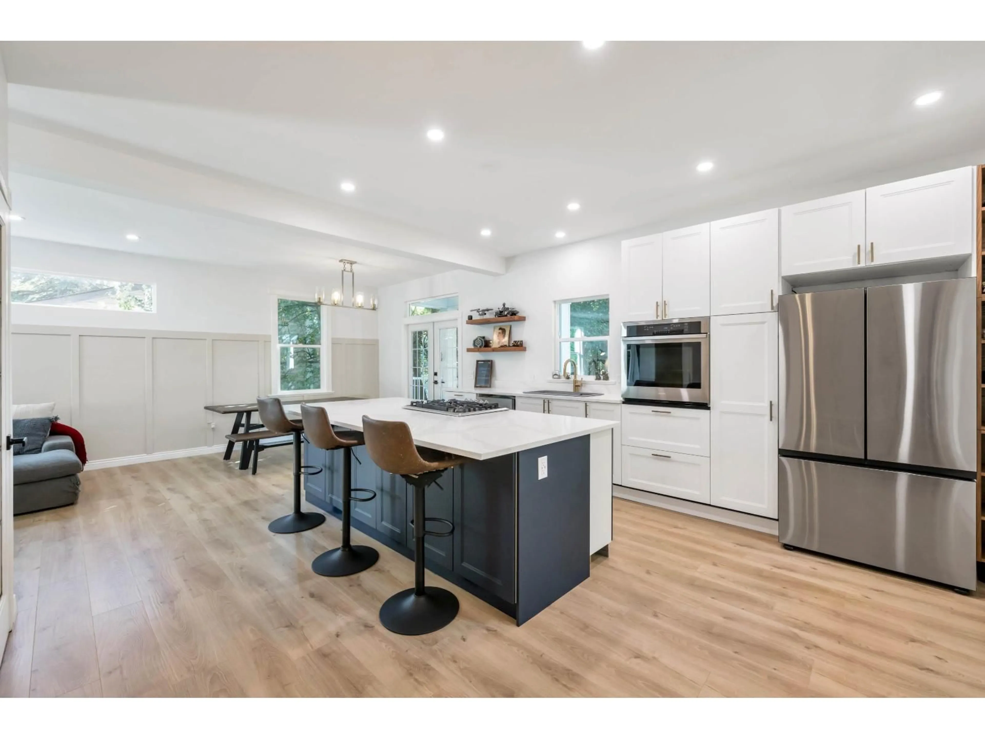Open concept kitchen, wood/laminate floor for 20010 50, Langley British Columbia V3A3S7