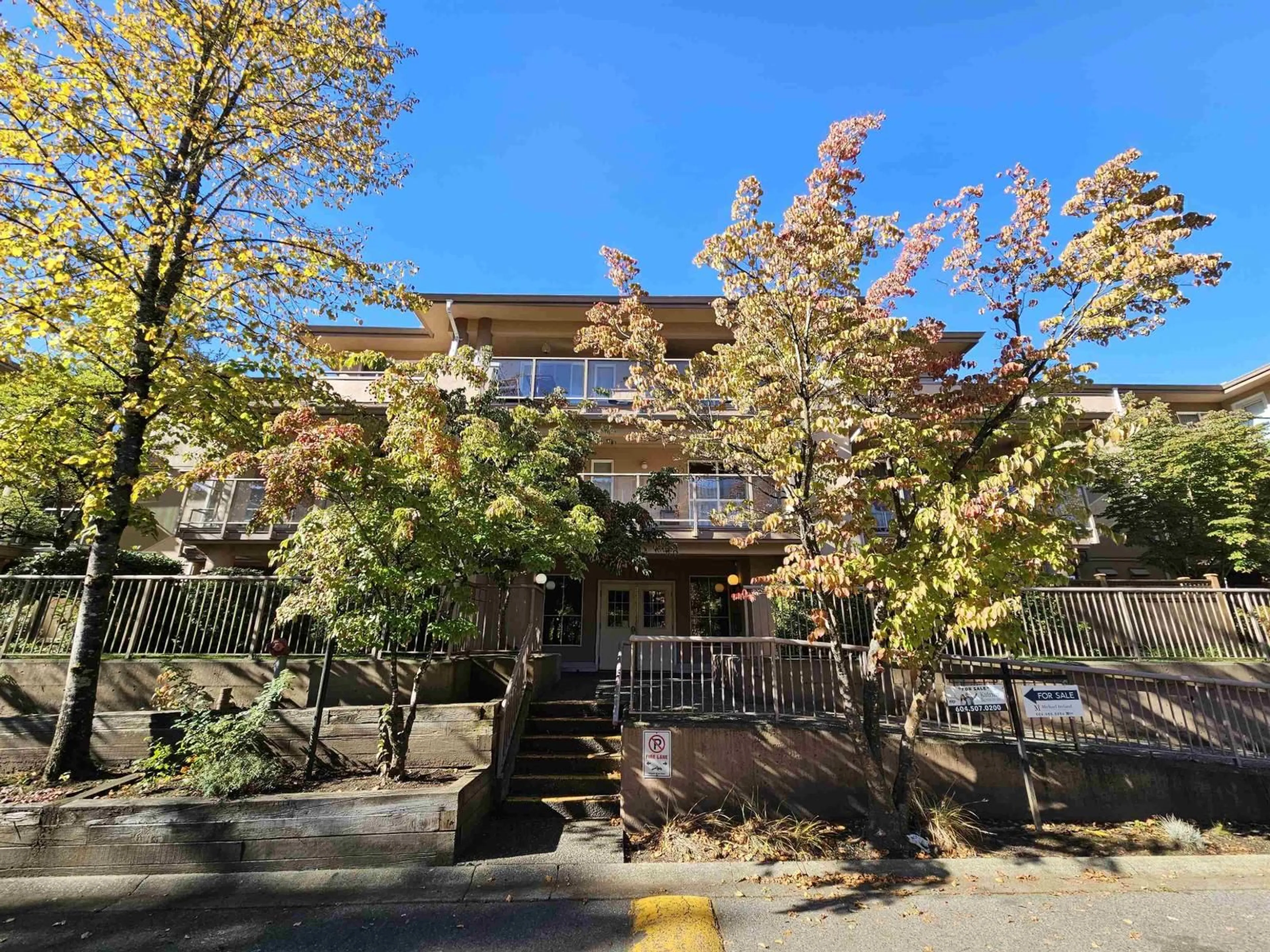 A pic from outside/outdoor area/front of a property/back of a property/a pic from drone, street for 302 - 14980 101A, Surrey British Columbia V3R0T1
