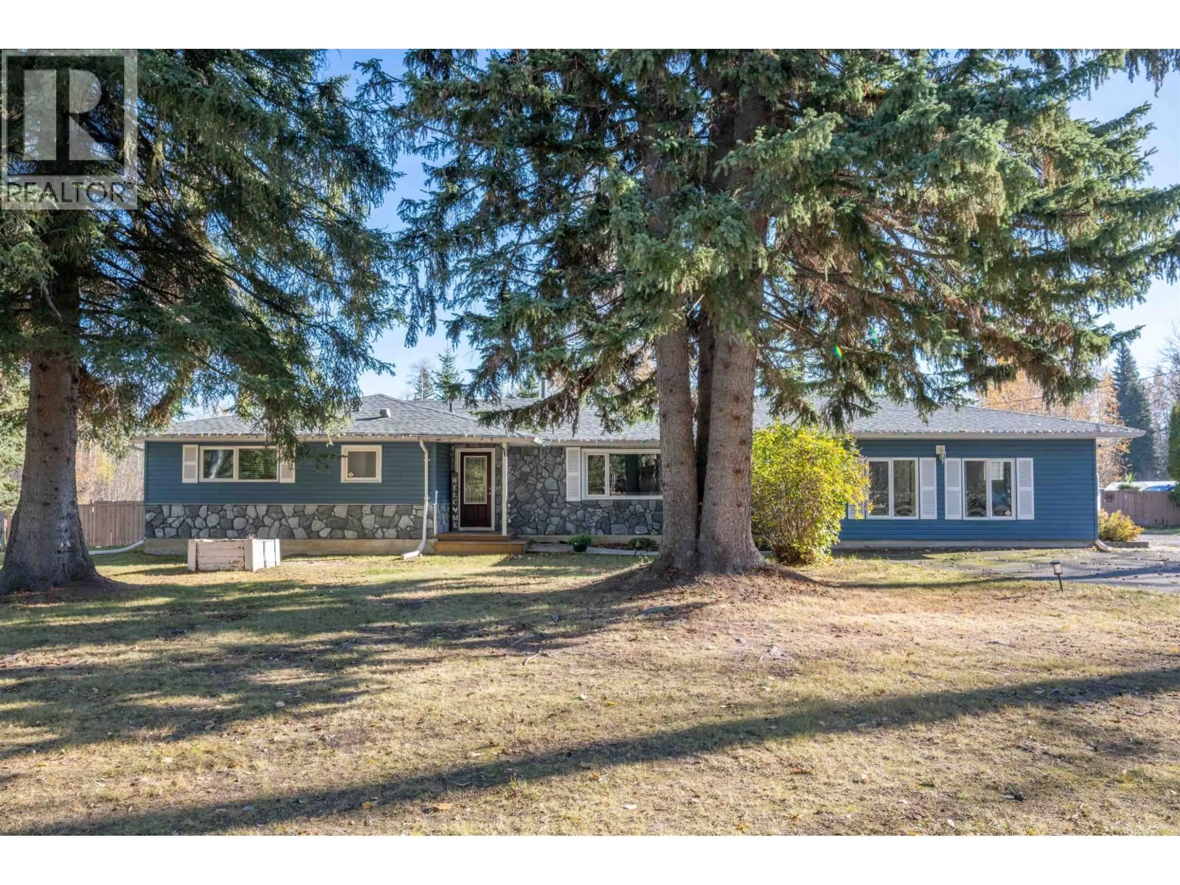 Home with vinyl exterior material, street for 9092 HILLTOP ROAD, Prince George British Columbia V2N6J8