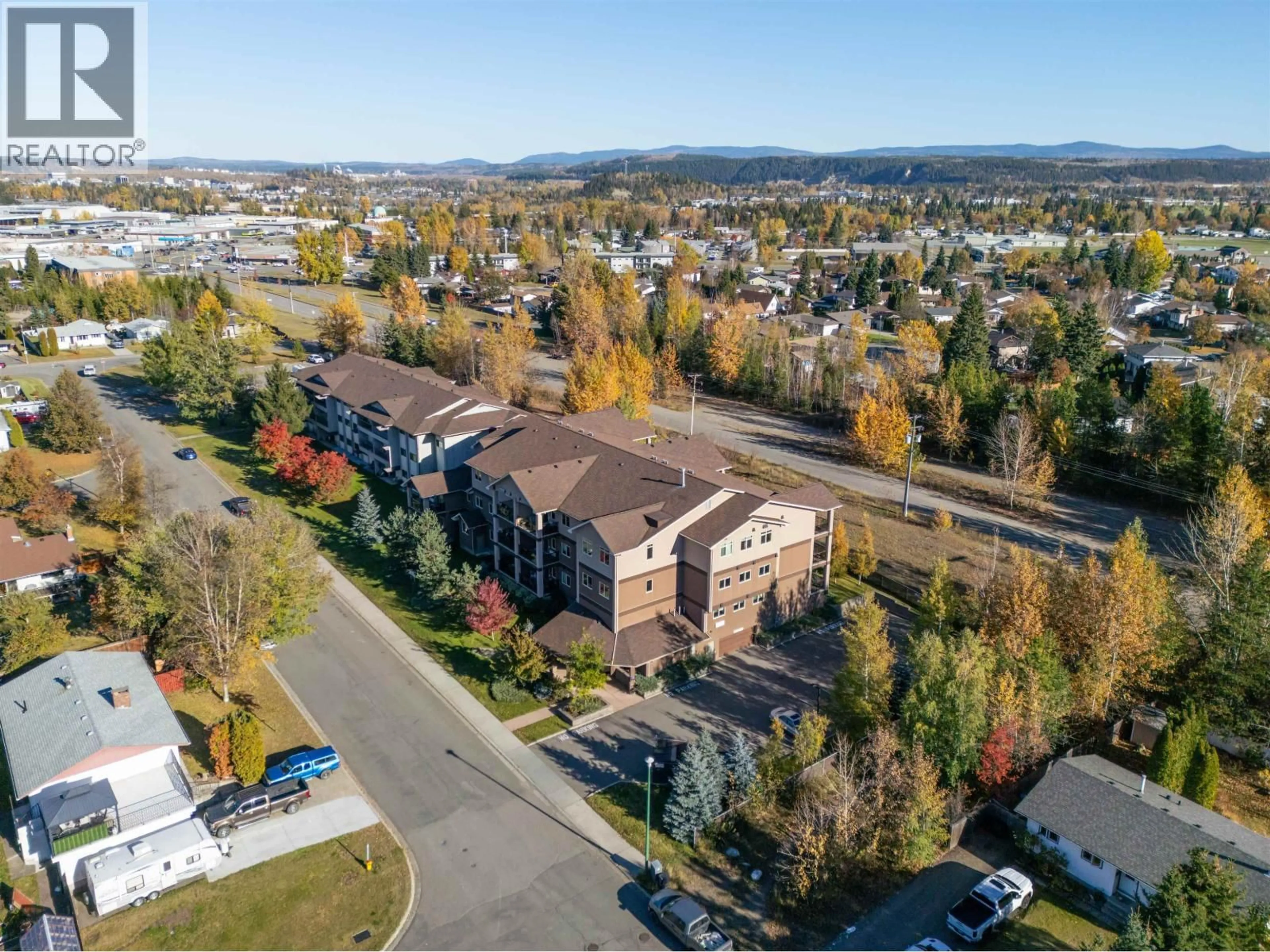 A pic from outside/outdoor area/front of a property/back of a property/a pic from drone, mountain view for 304 - 4251 GUEST CRESCENT, Prince George British Columbia V2N3G9