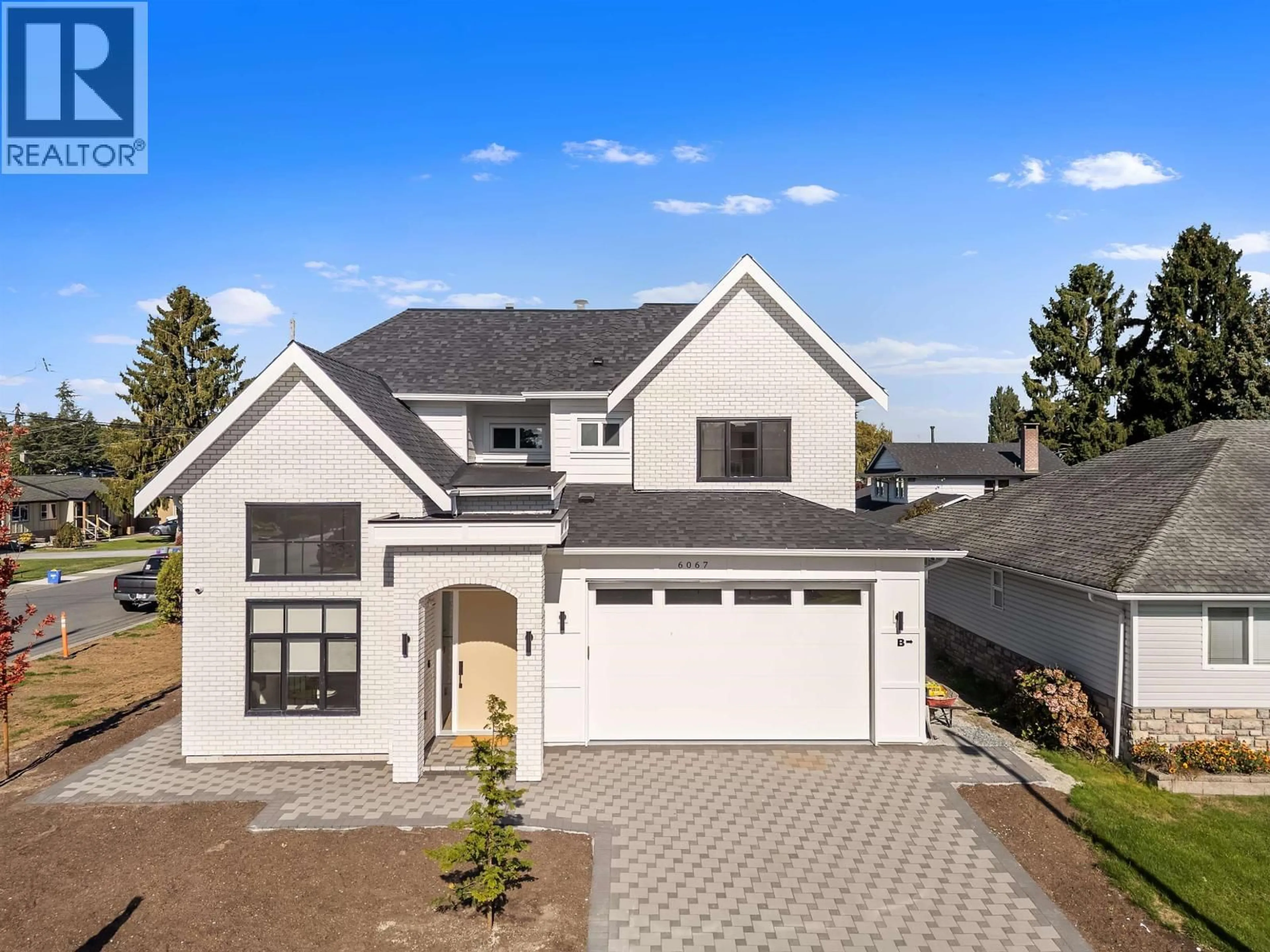 Home with brick exterior material, street for 6067 44A AVENUE, Ladner British Columbia V4K4C8