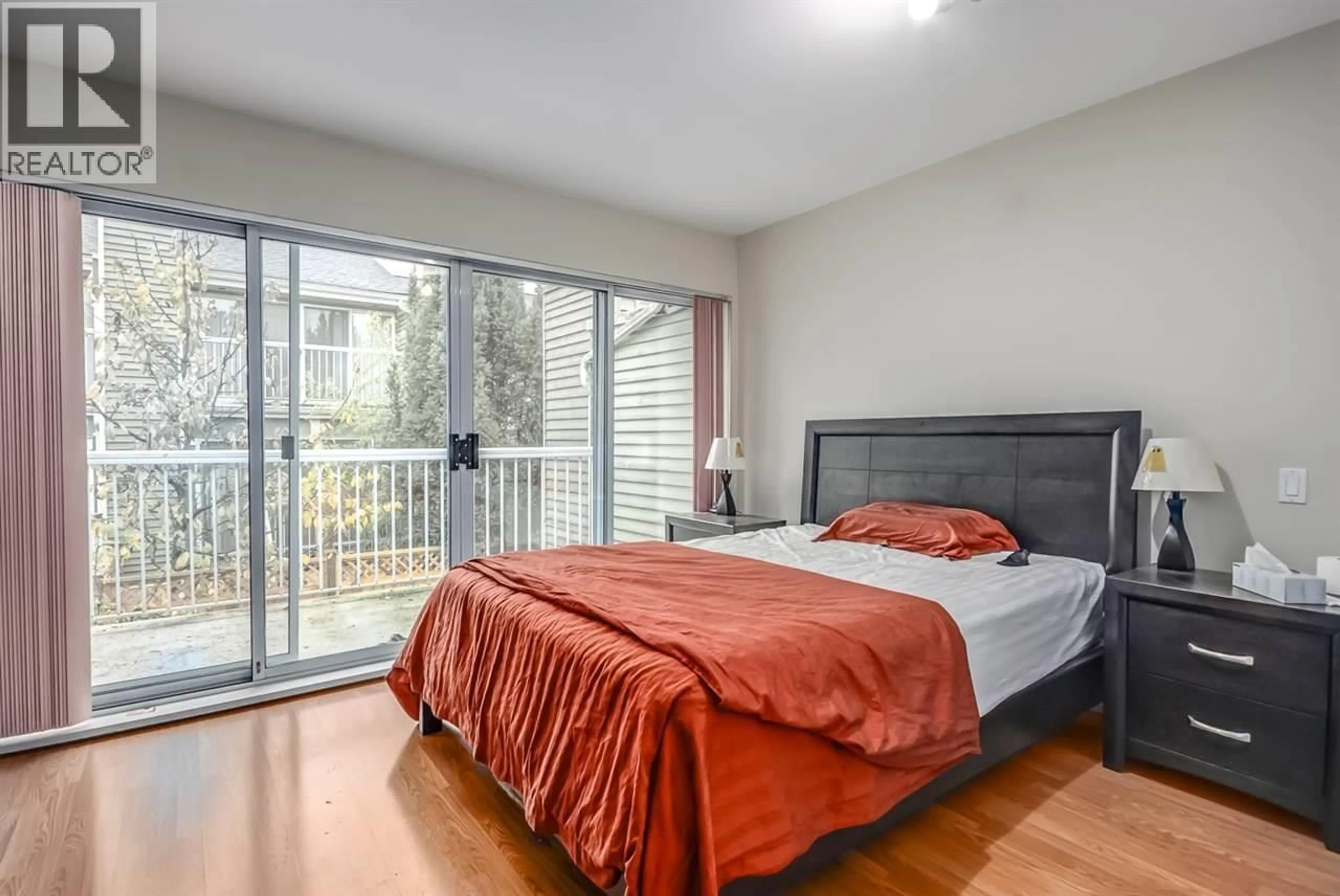 Bedroom with bed, wood/laminate floor for 8410 KEYSTONE STREET, Vancouver British Columbia V5S4S2