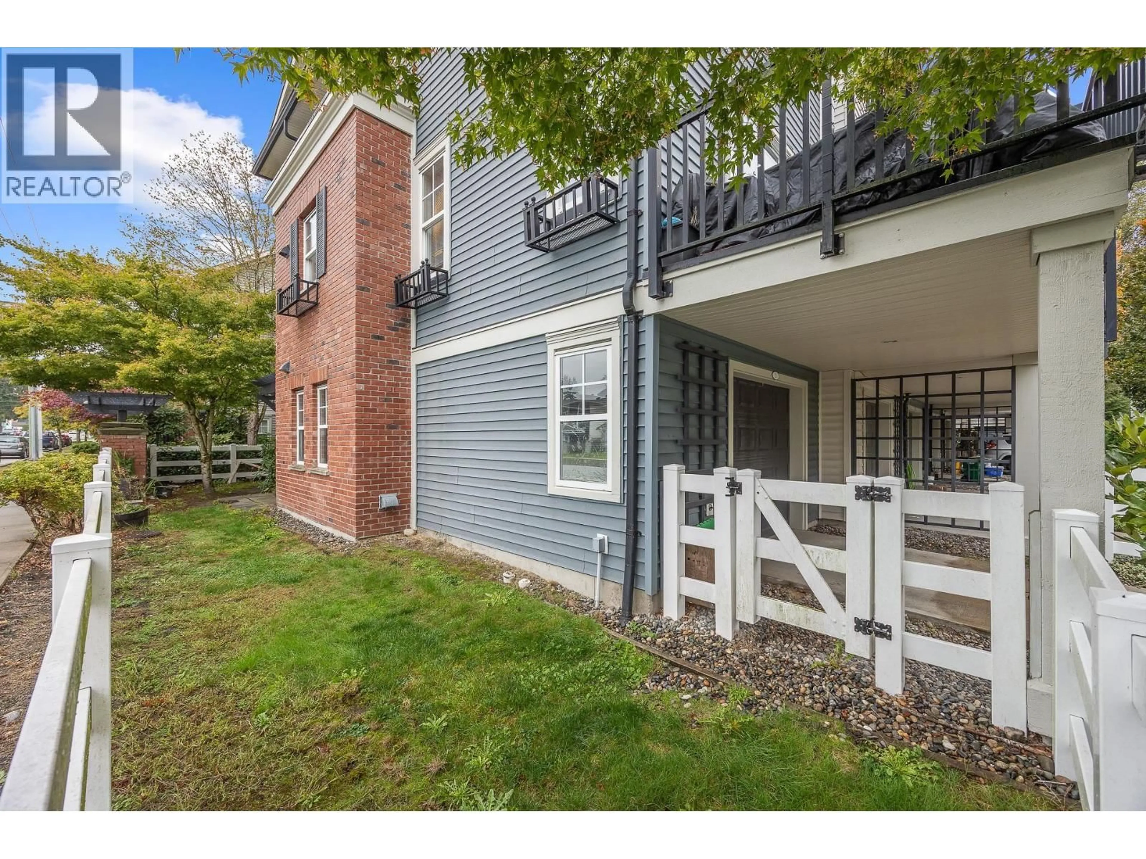 A pic from outside/outdoor area/front of a property/back of a property/a pic from drone, street for 5 - 2495 DAVIES AVENUE, Port Coquitlam British Columbia V3C0B2