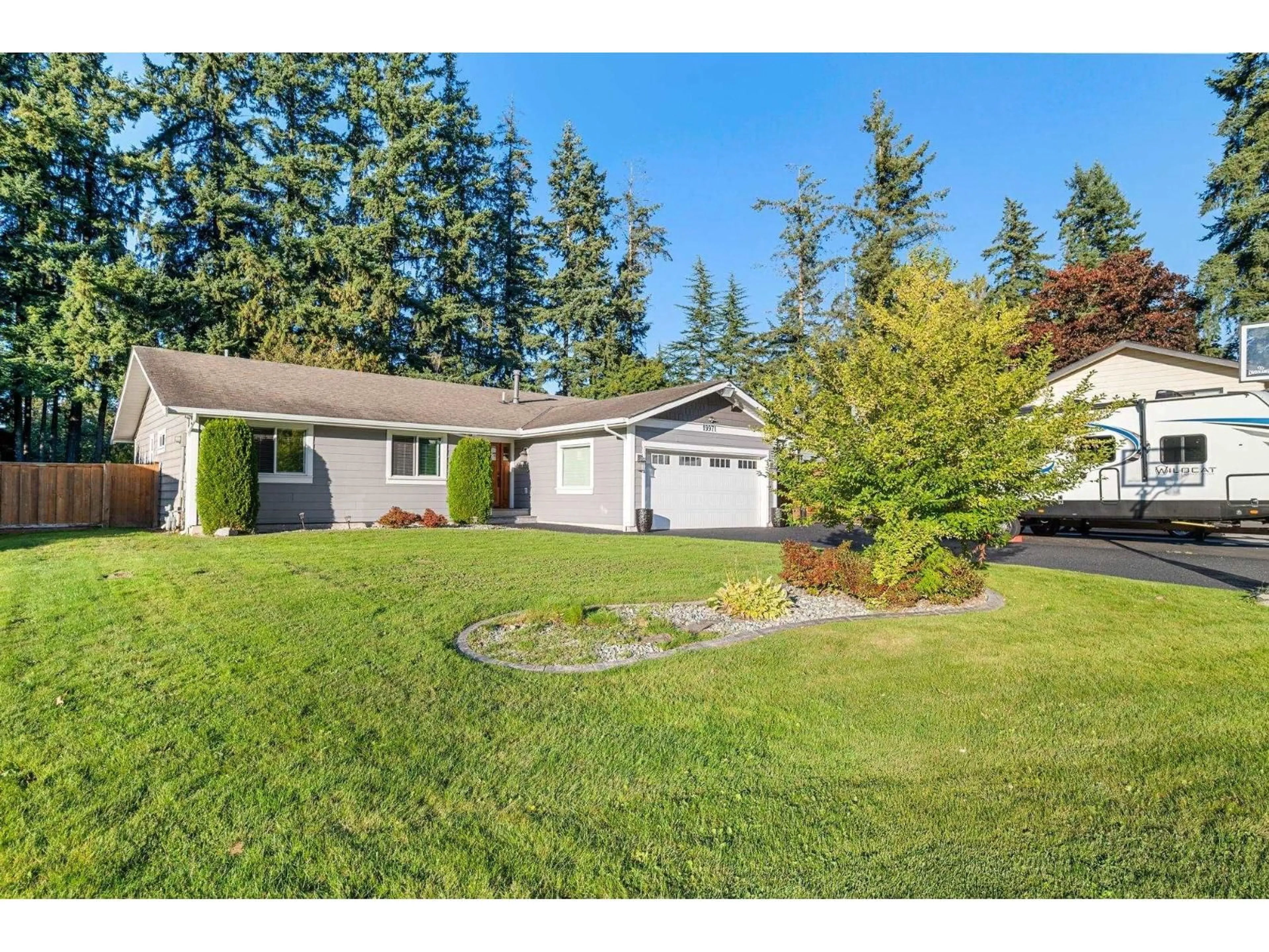 Home with vinyl exterior material, street for 19971 39A, Langley British Columbia V3A7G3