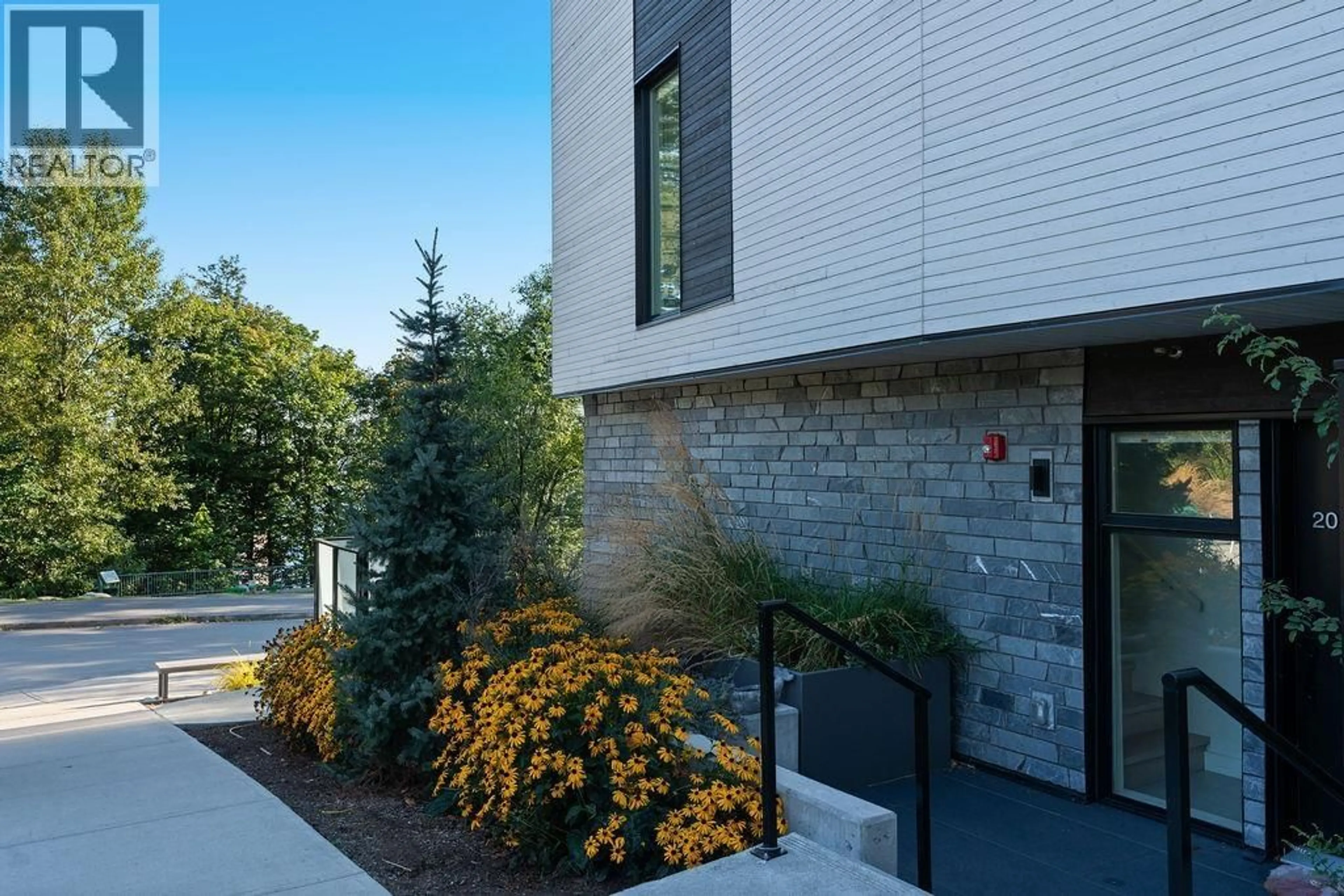 Home with brick exterior material, street for 201 - 650 2ND STREET, North Vancouver British Columbia V7M1E3