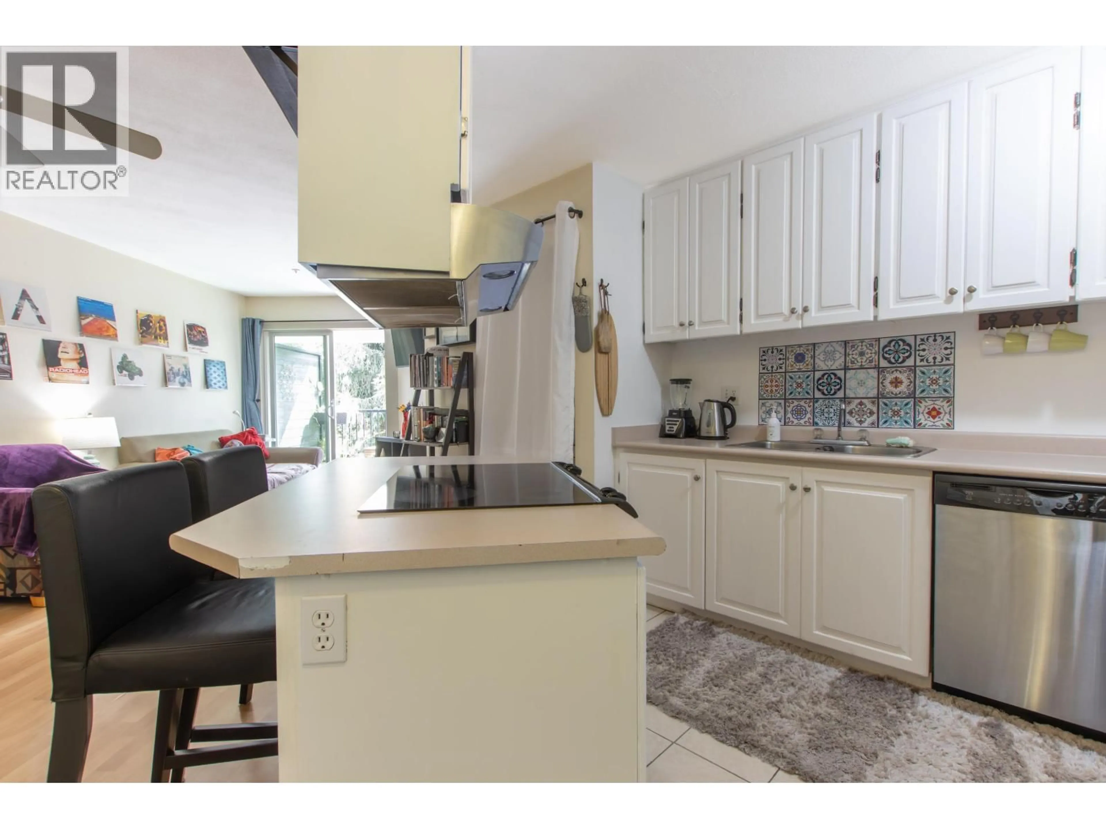 Open concept kitchen, ceramic/tile floor for E210 - 40180 WILLOW CRESCENT, Squamish British Columbia V8B0M3