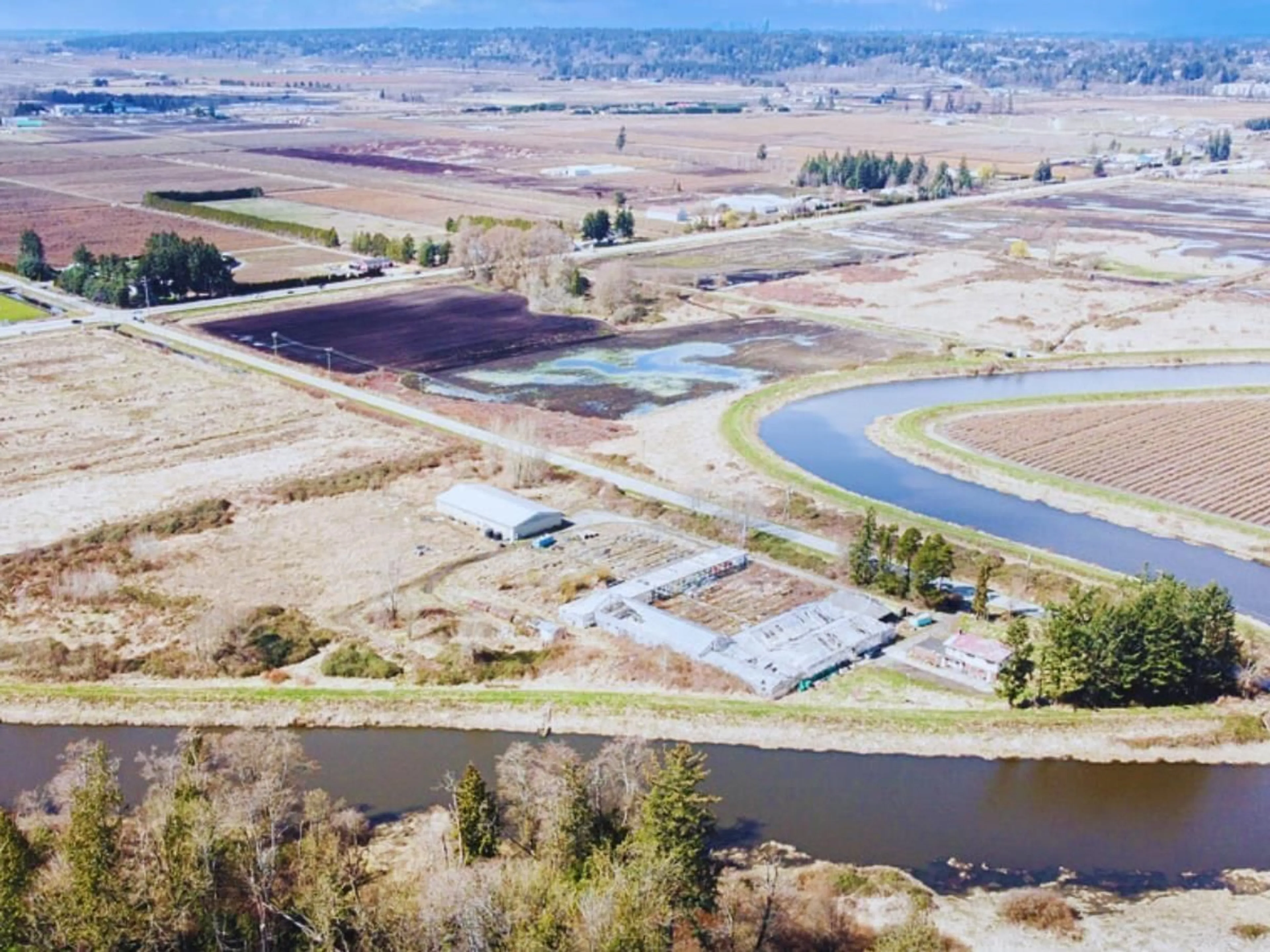 A pic from outside/outdoor area/front of a property/back of a property/a pic from drone, water/lake/river/ocean view for 15442 40, Surrey British Columbia V3Z1E6