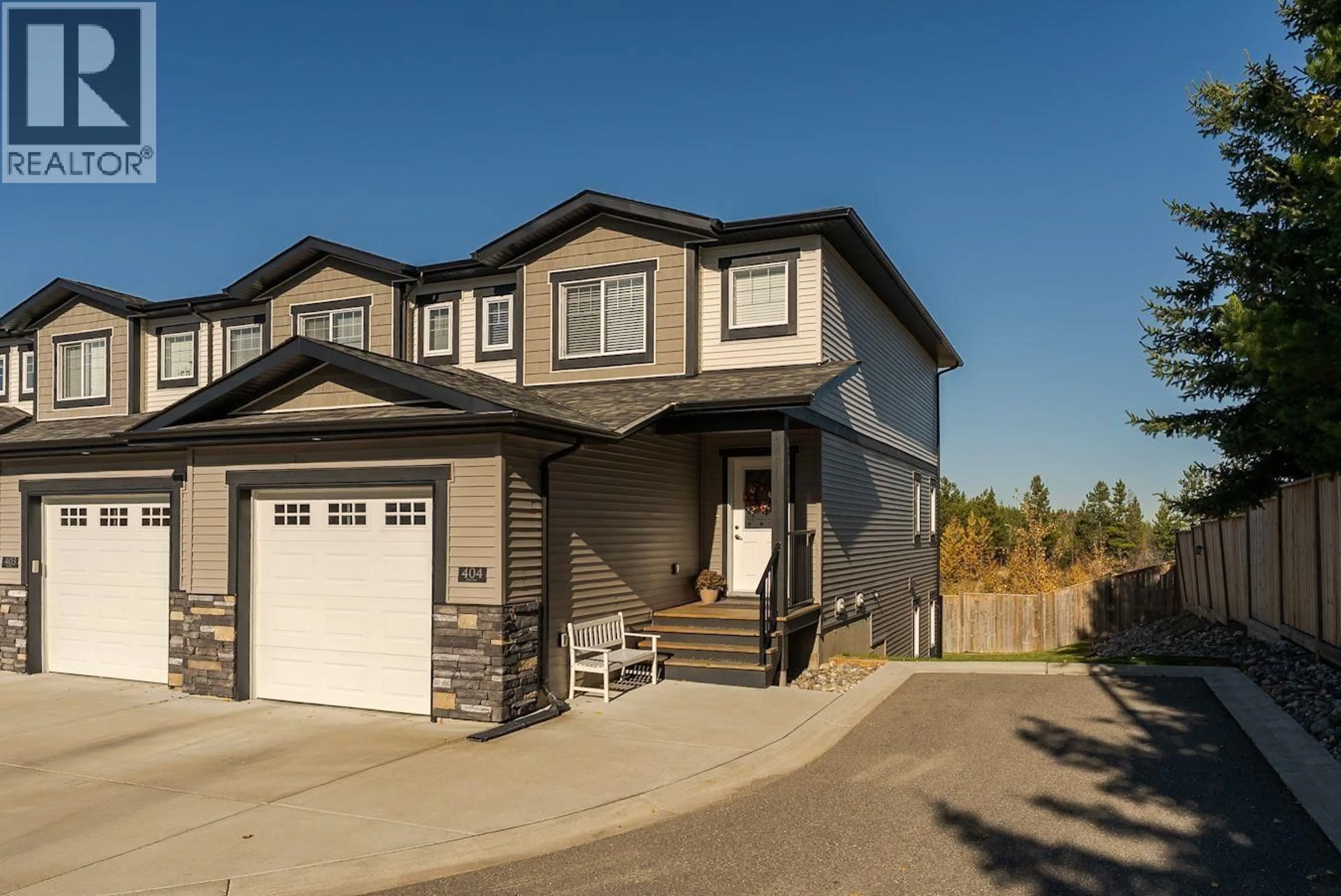 Home with vinyl exterior material, street for 404 - 6798 WESTGATE AVENUE, Prince George British Columbia V2N0H6