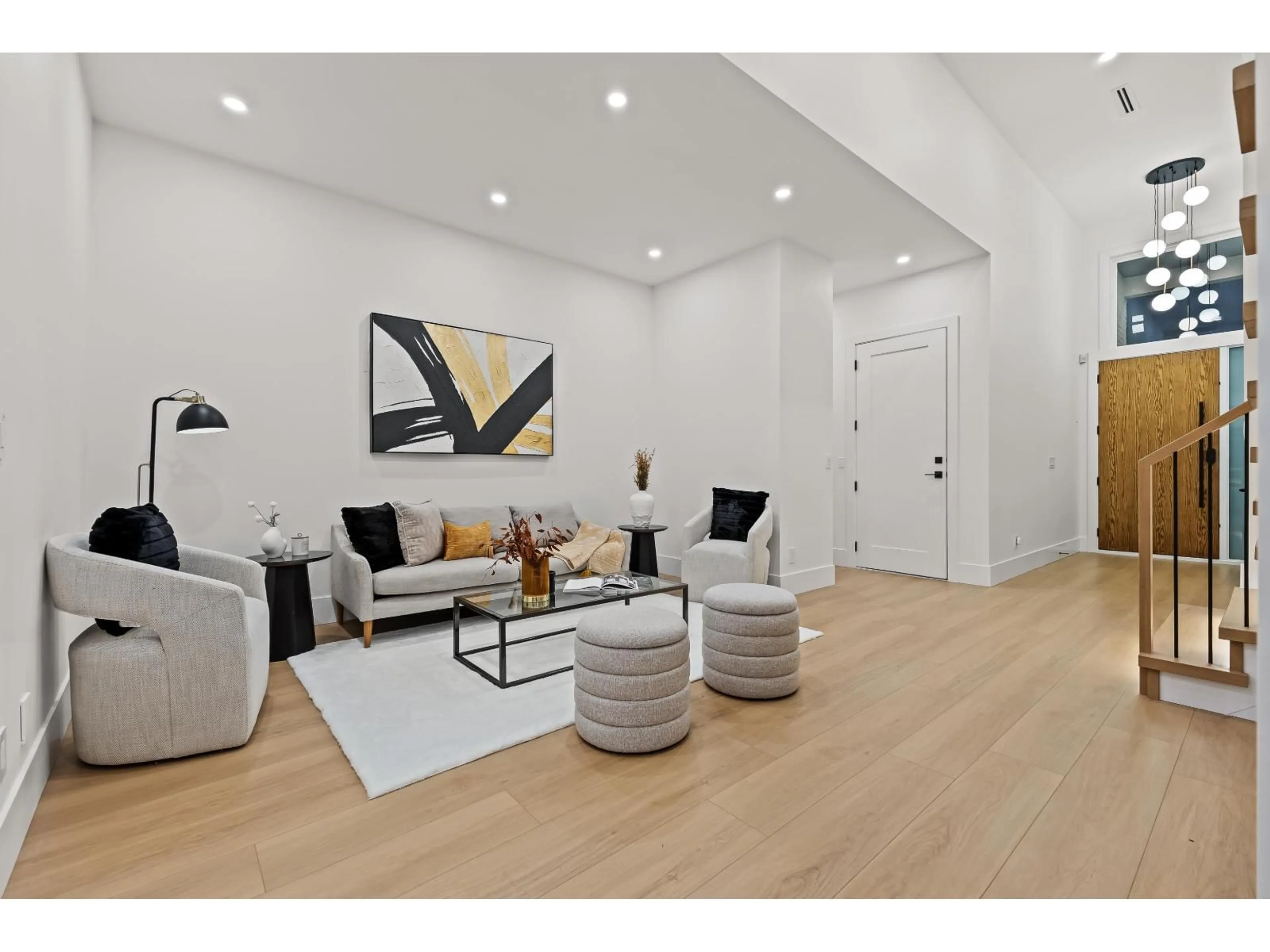 Living room with furniture, wood/laminate floor for 11642 94A, Delta British Columbia V4C3S3