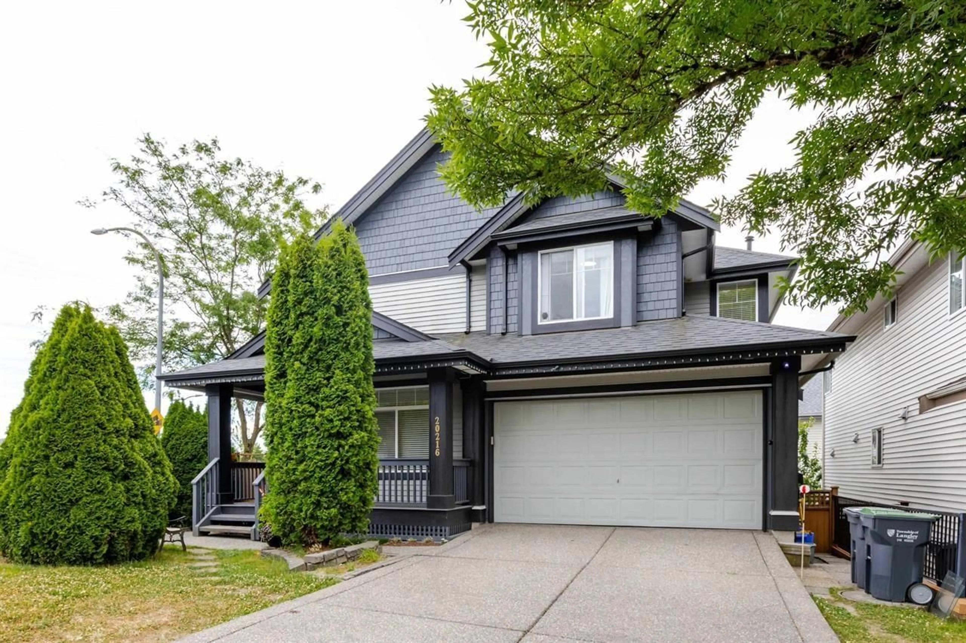 Home with vinyl exterior material, street for 20216 70A, Langley British Columbia V2Y2Y6