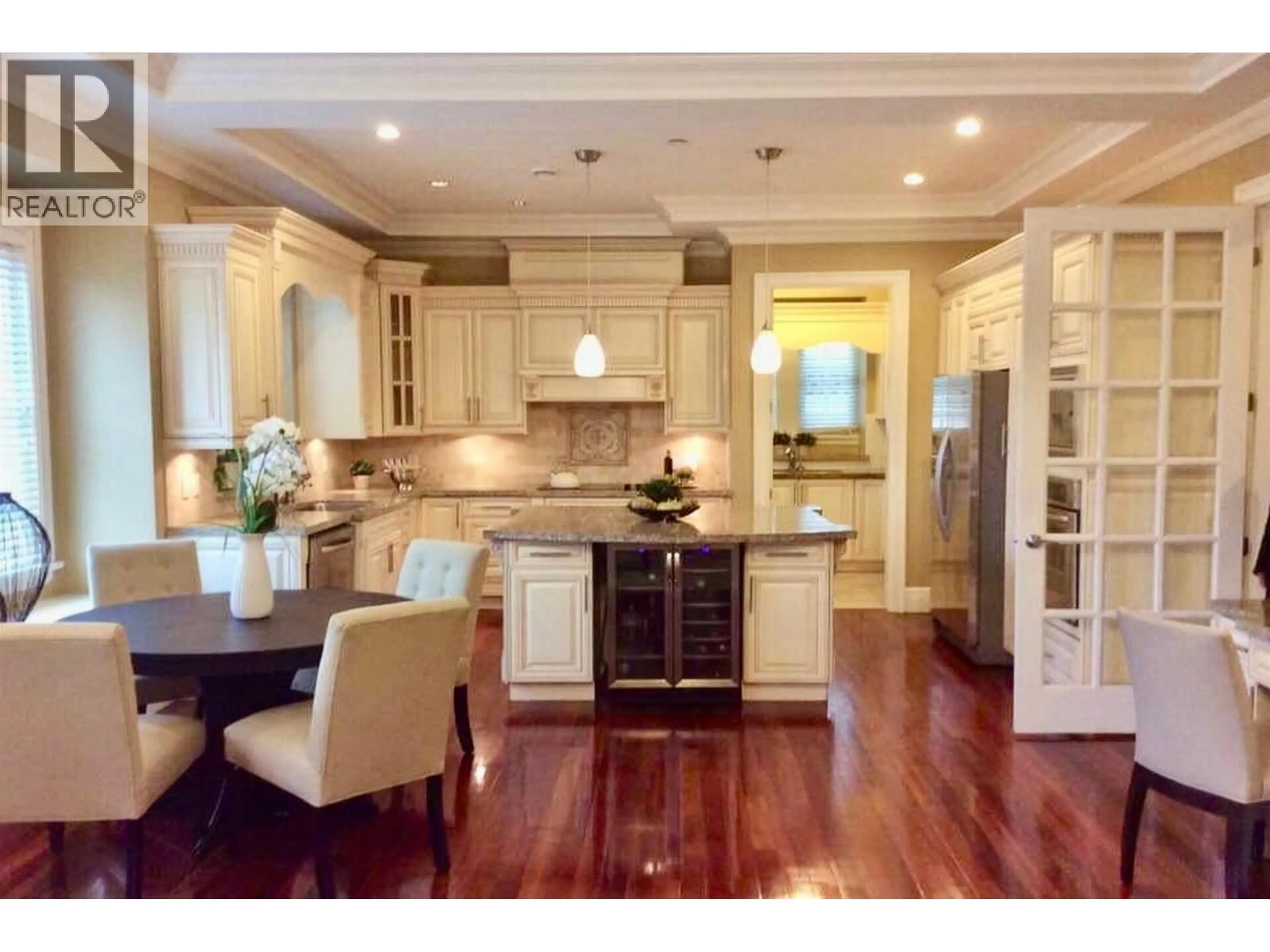 Open concept kitchen, wood/laminate floor for 2228 22ND AVENUE, Vancouver British Columbia V6L1L7