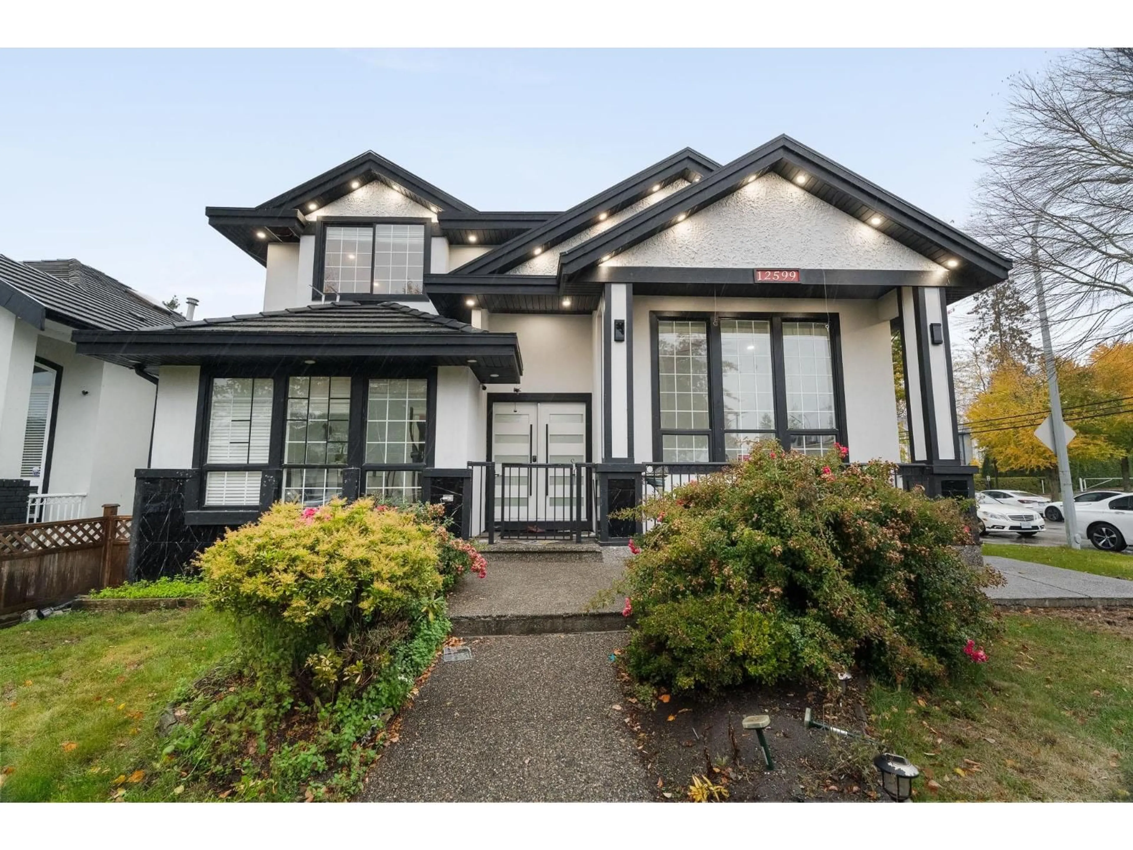 Home with vinyl exterior material, street for 12599 62B, Surrey British Columbia V3X3M9