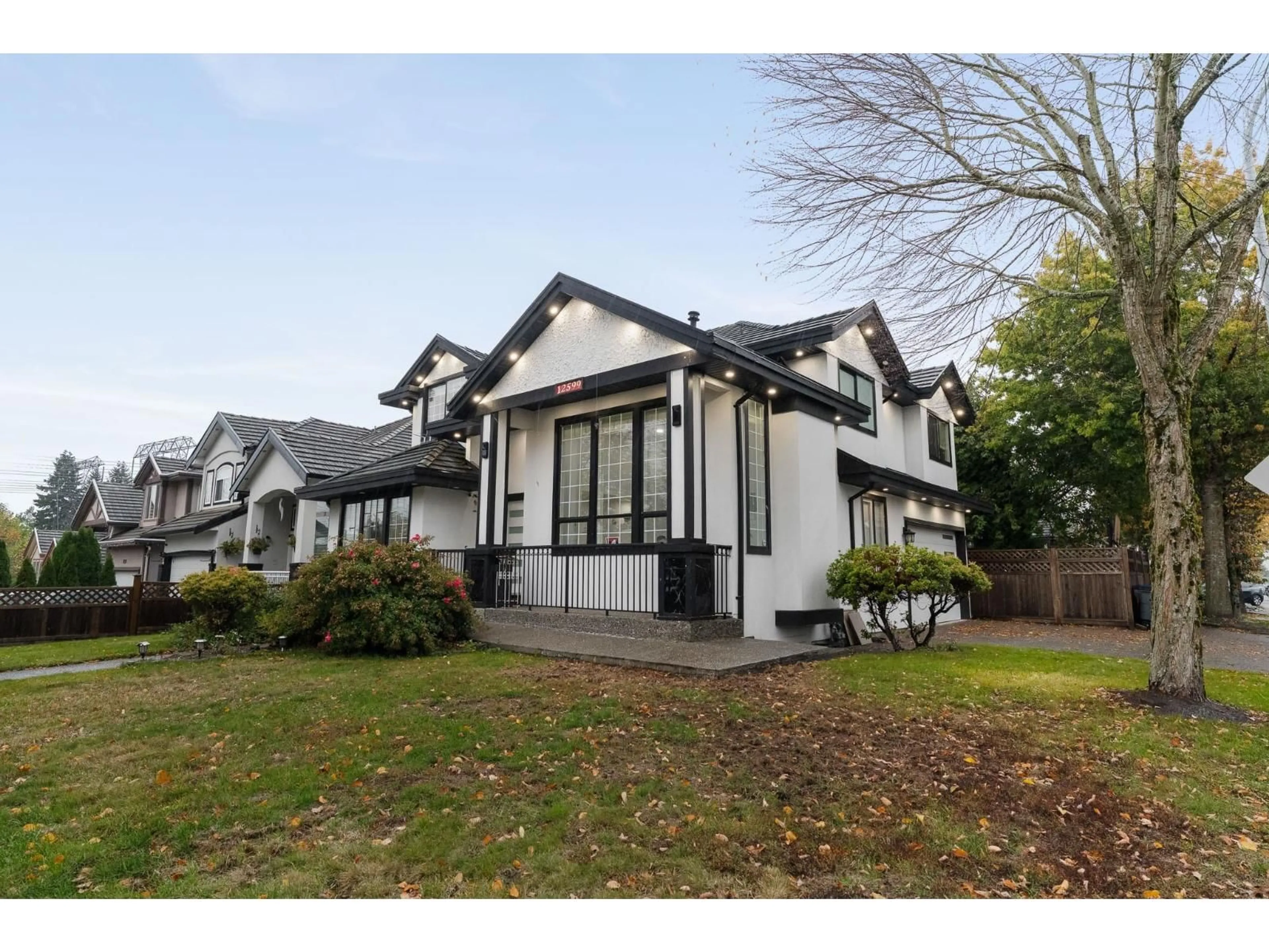 Home with vinyl exterior material, street for 12599 62B, Surrey British Columbia V3X3M9