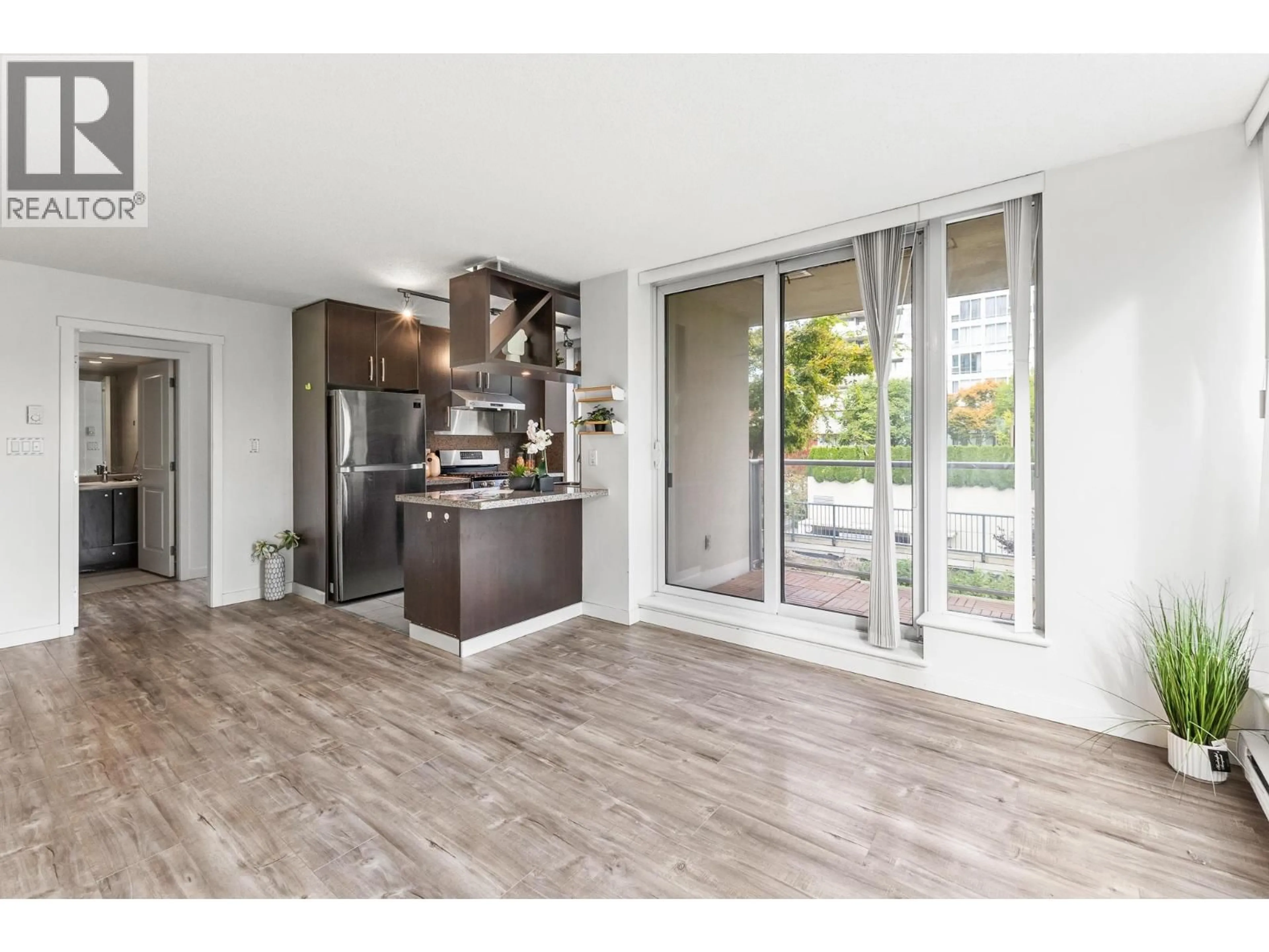 Open concept kitchen, wood/laminate floor for 503 - 5088 KWANTLEN STREET, Richmond British Columbia V6X4K5