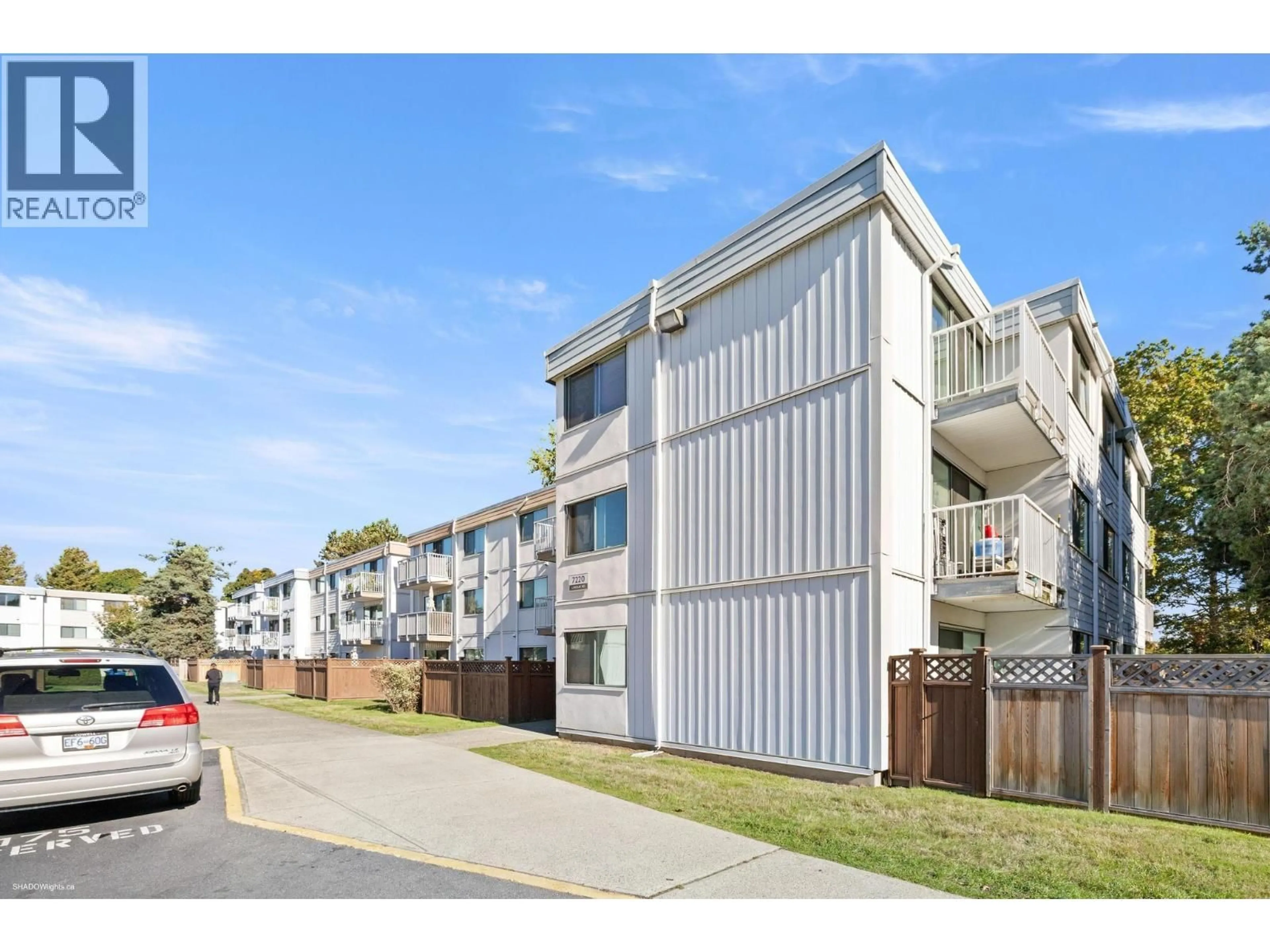 A pic from outside/outdoor area/front of a property/back of a property/a pic from drone, street for 109 - 7220 LINDSAY ROAD, Richmond British Columbia V7C3M6