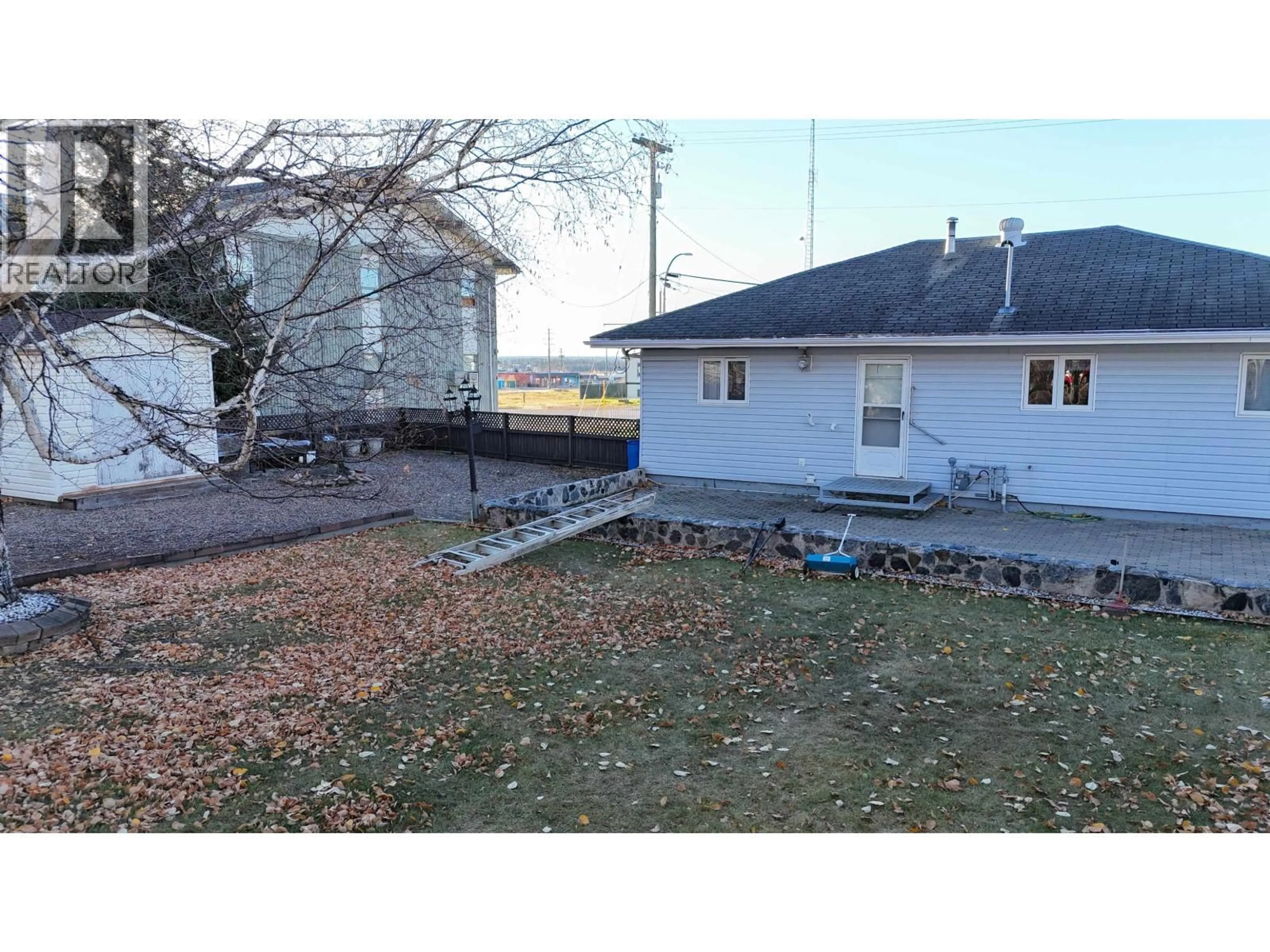 A pic from outside/outdoor area/front of a property/back of a property/a pic from drone, unknown for 5012 52 AVENUE, Fort Nelson British Columbia V0C1R0