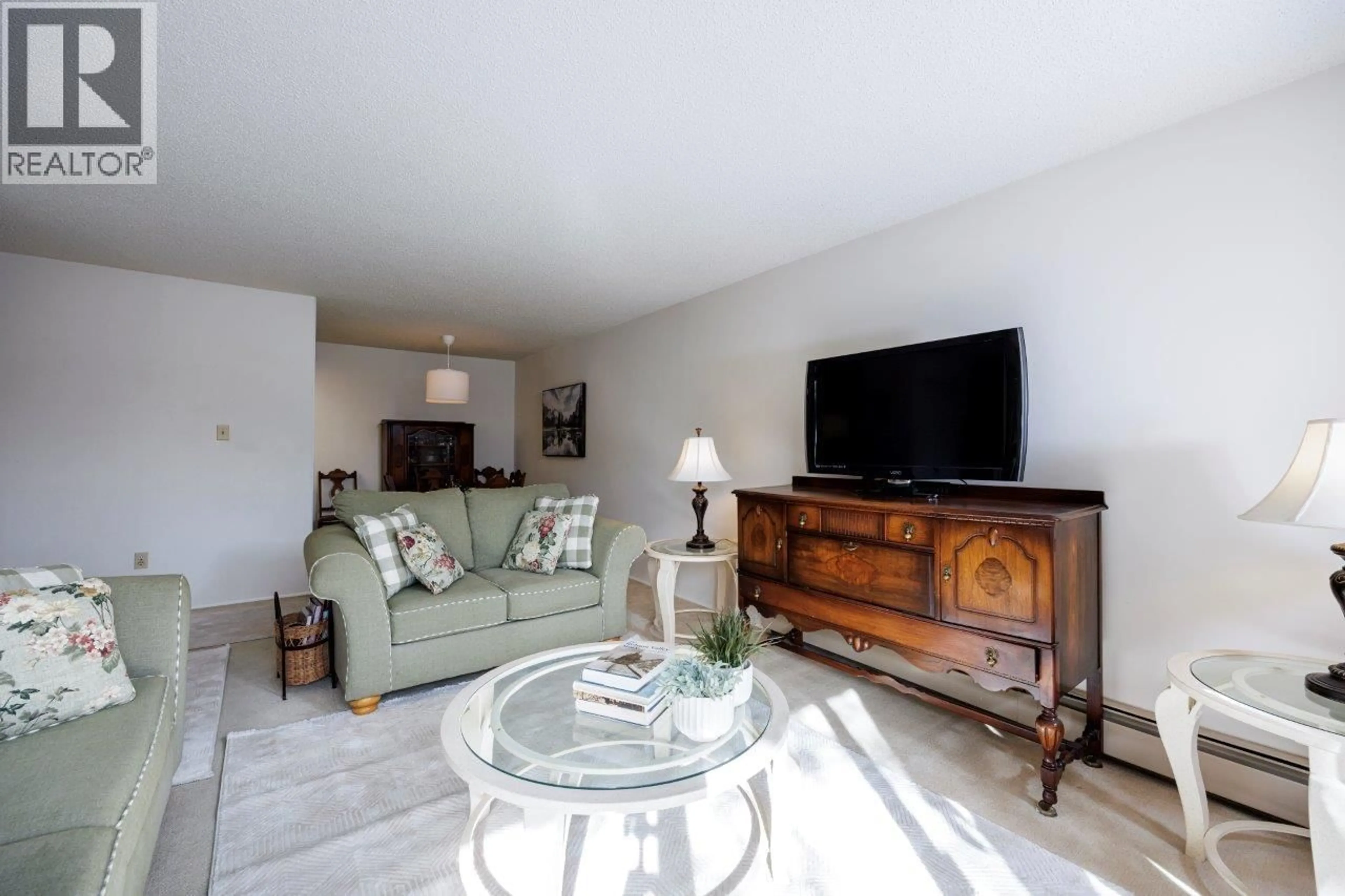 Living room with furniture, unknown for 213 - 6669 TELFORD AVENUE, Burnaby British Columbia V5H4A1