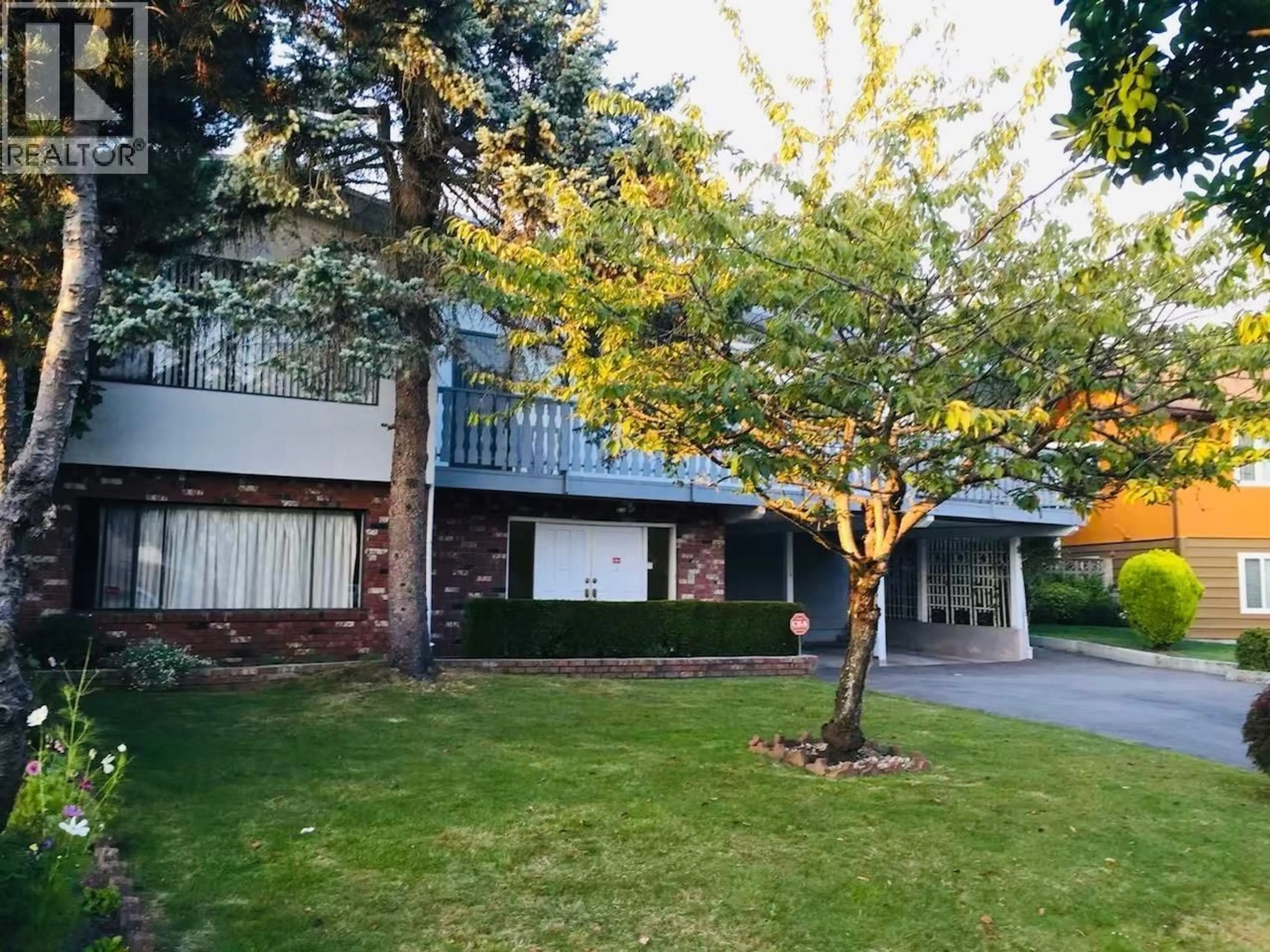 A pic from outside/outdoor area/front of a property/back of a property/a pic from drone, street for 3431 52ND AVENUE, Vancouver British Columbia V5S1V6