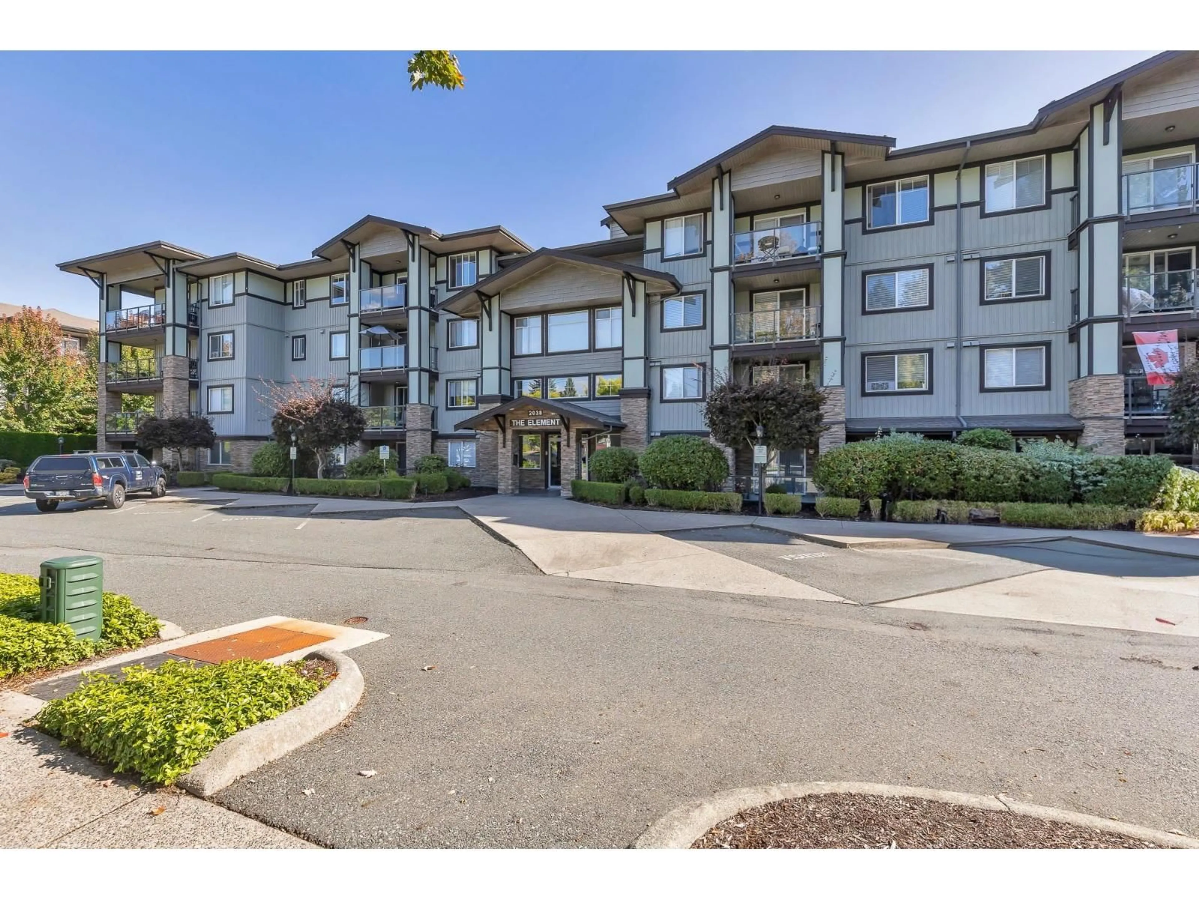 A pic from outside/outdoor area/front of a property/back of a property/a pic from drone, unknown for 305 - 2038 SANDALWOOD, Abbotsford British Columbia V2S3H6