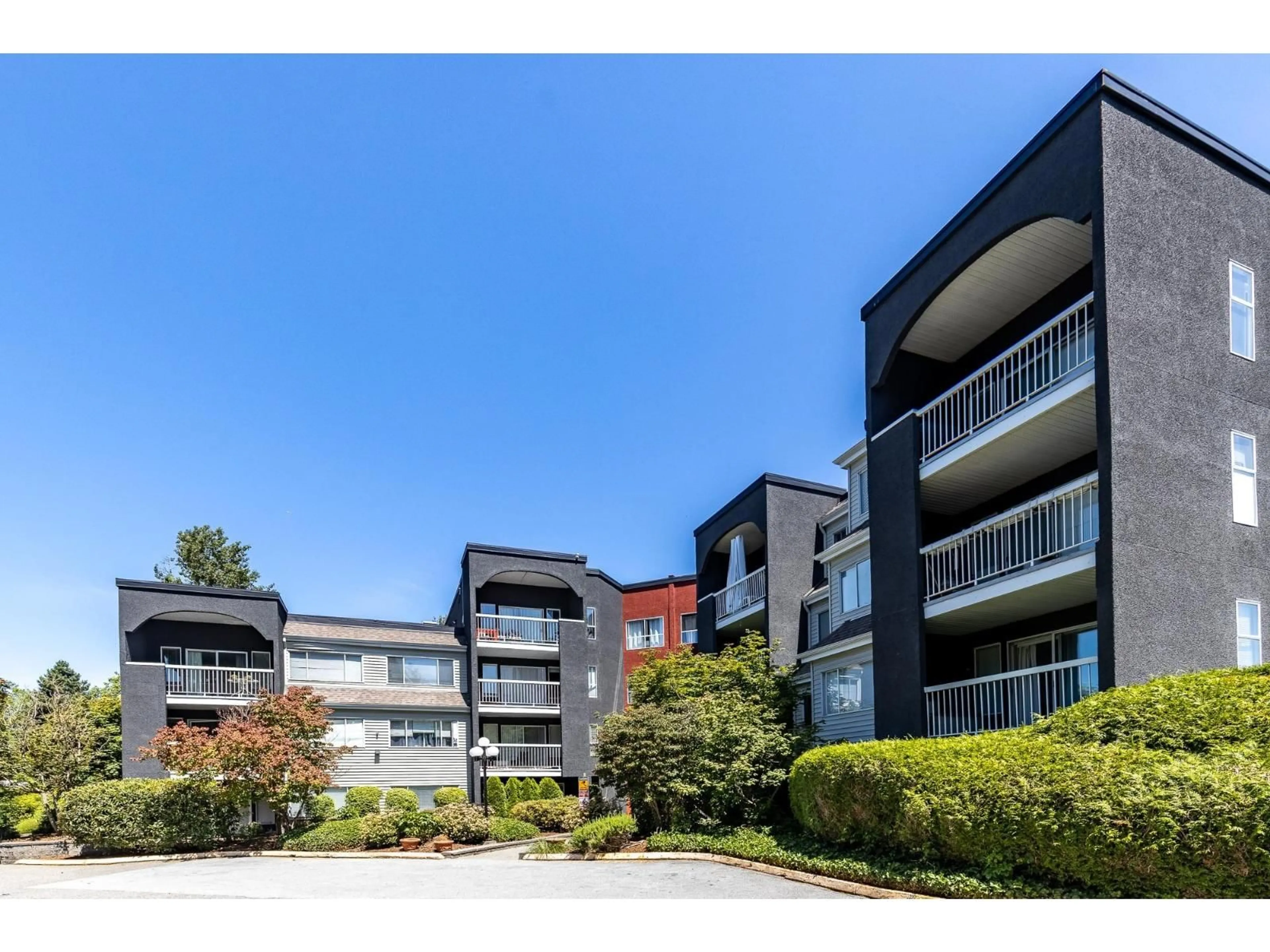 A pic from outside/outdoor area/front of a property/back of a property/a pic from drone, unknown for 202 - 5700 200, Langley British Columbia V3A7S6