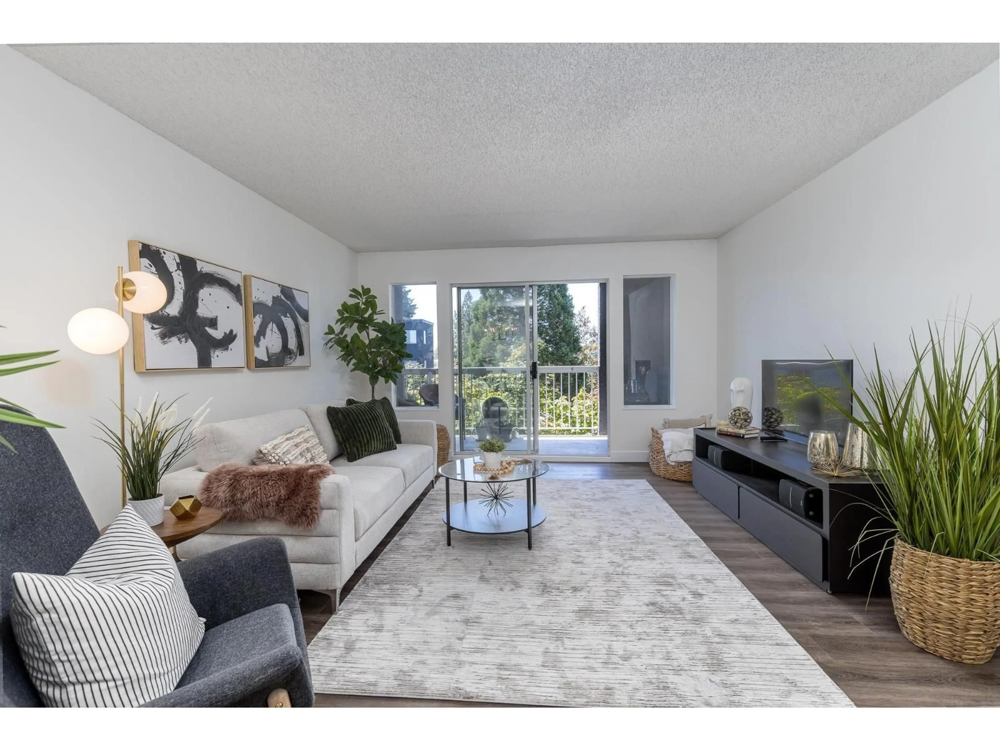 Living room with furniture, unknown for 202 - 5700 200, Langley British Columbia V3A7S6