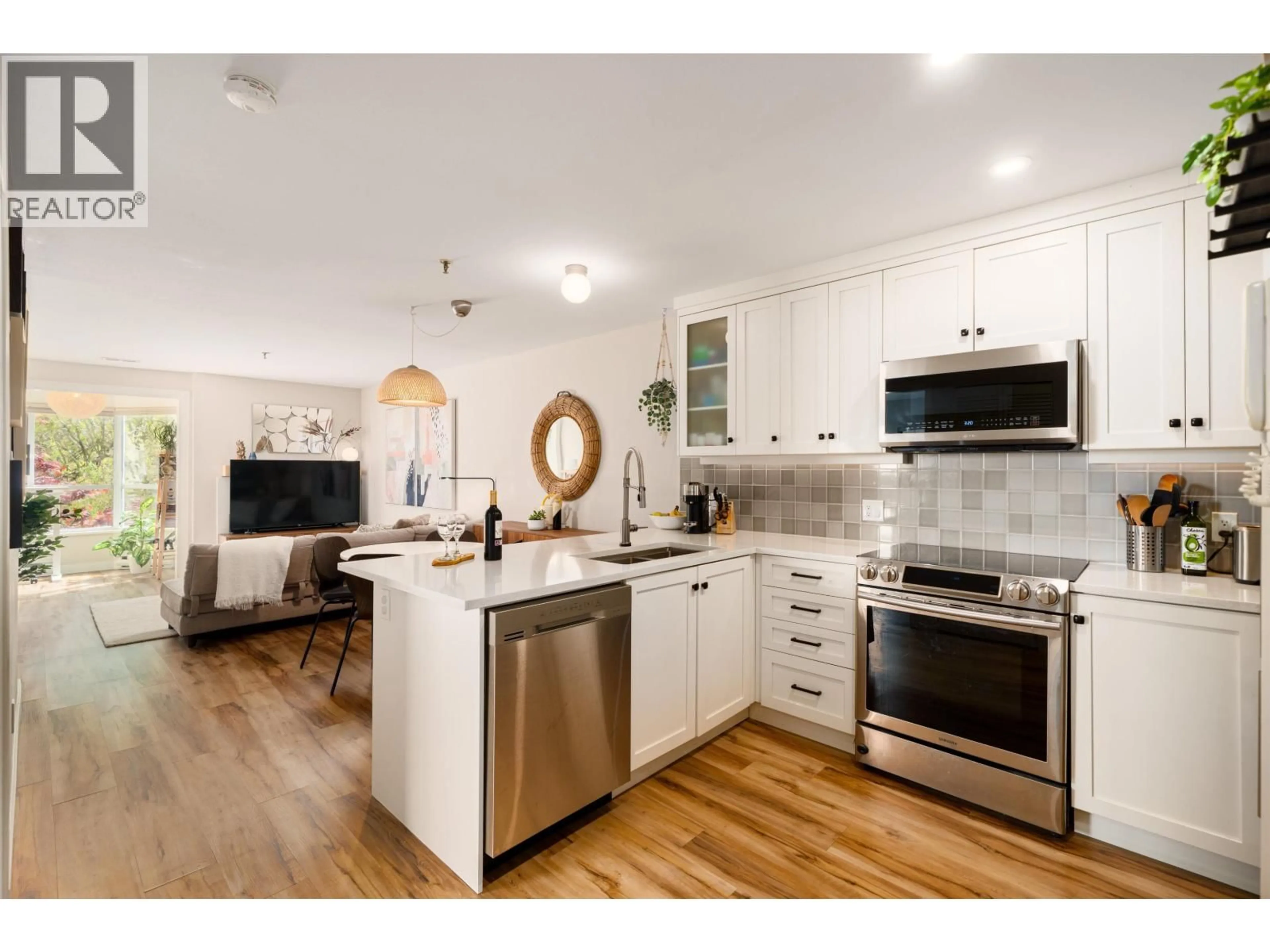 Open concept kitchen, unknown for 302 - 2333 ETON STREET, Vancouver British Columbia V5L1E2