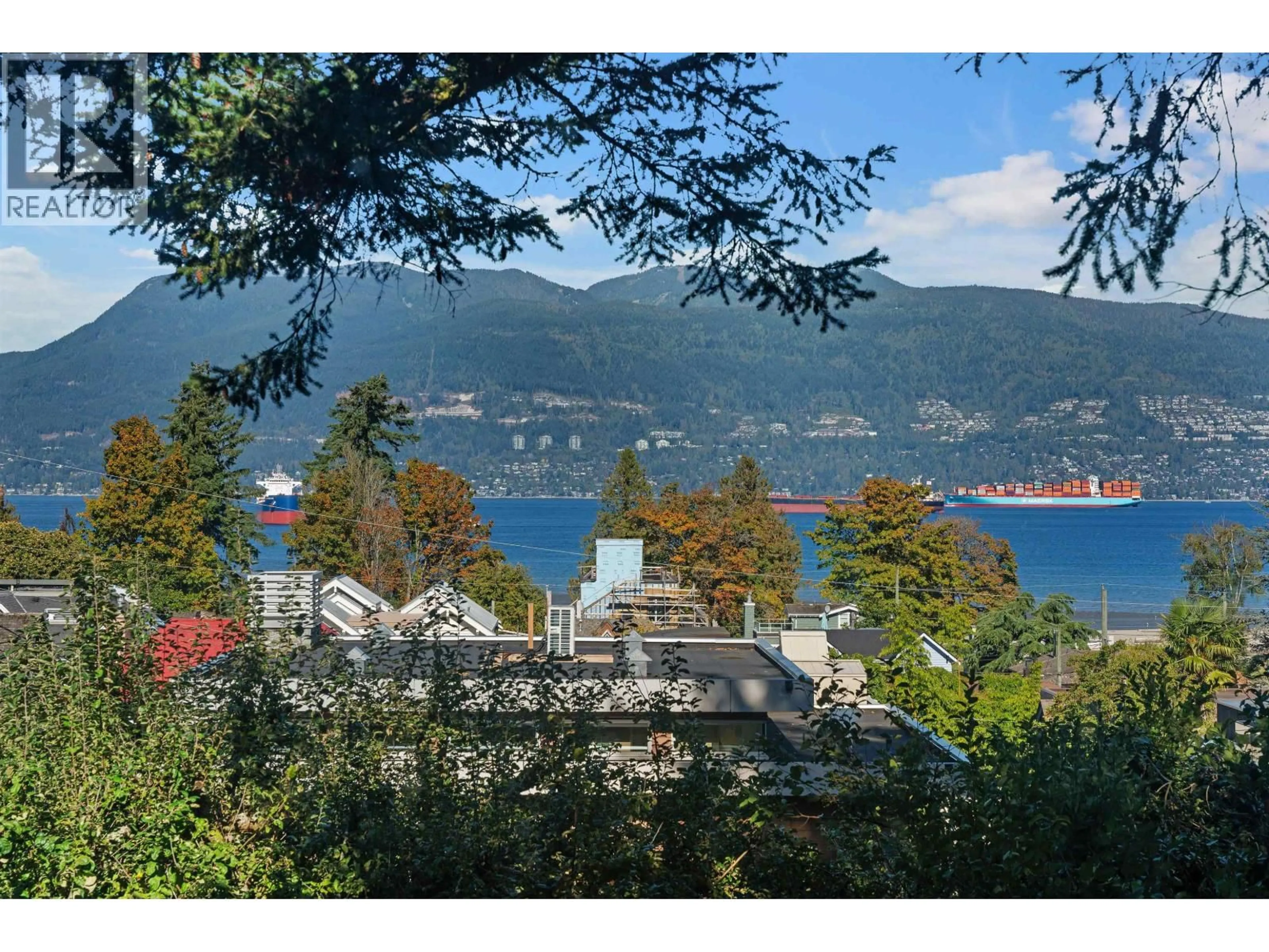 A pic from outside/outdoor area/front of a property/back of a property/a pic from drone, water/lake/river/ocean view for 4523 1ST AVENUE, Vancouver British Columbia V6R1H7
