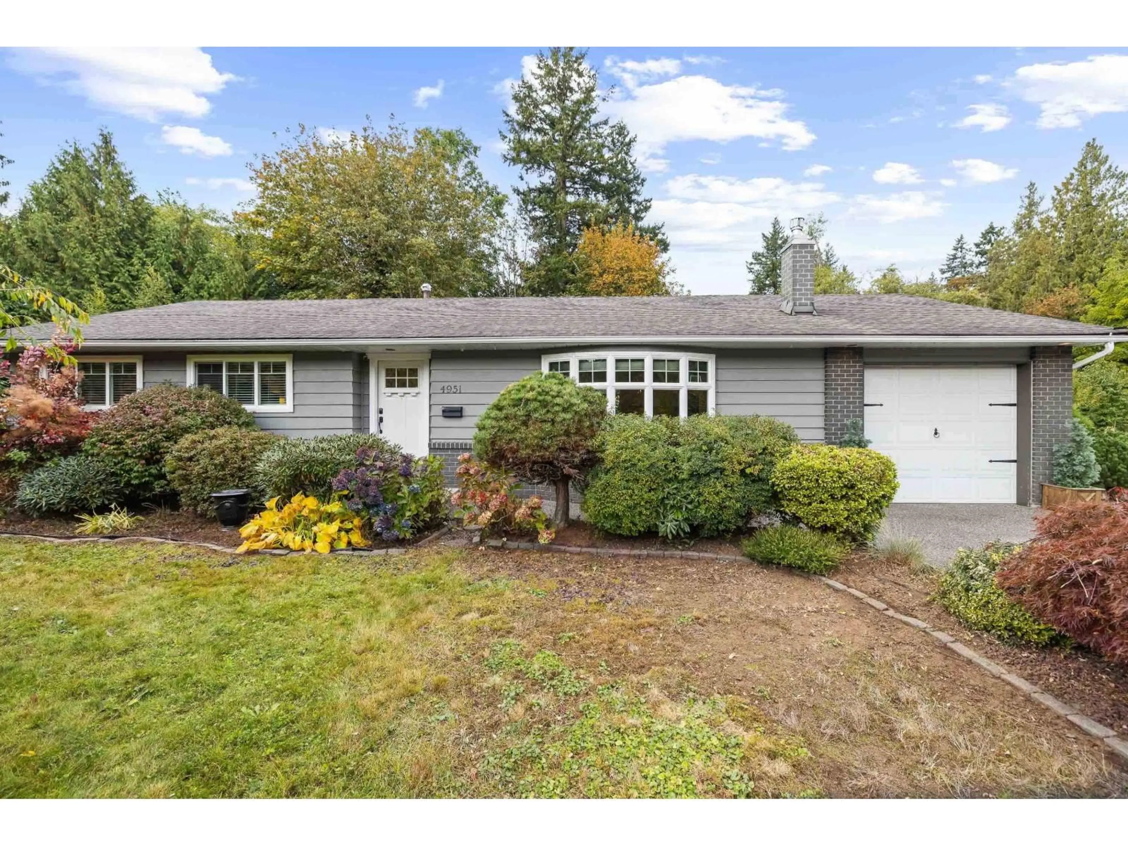 Home with vinyl exterior material, street for 4951 199A, Langley British Columbia V3A1J5