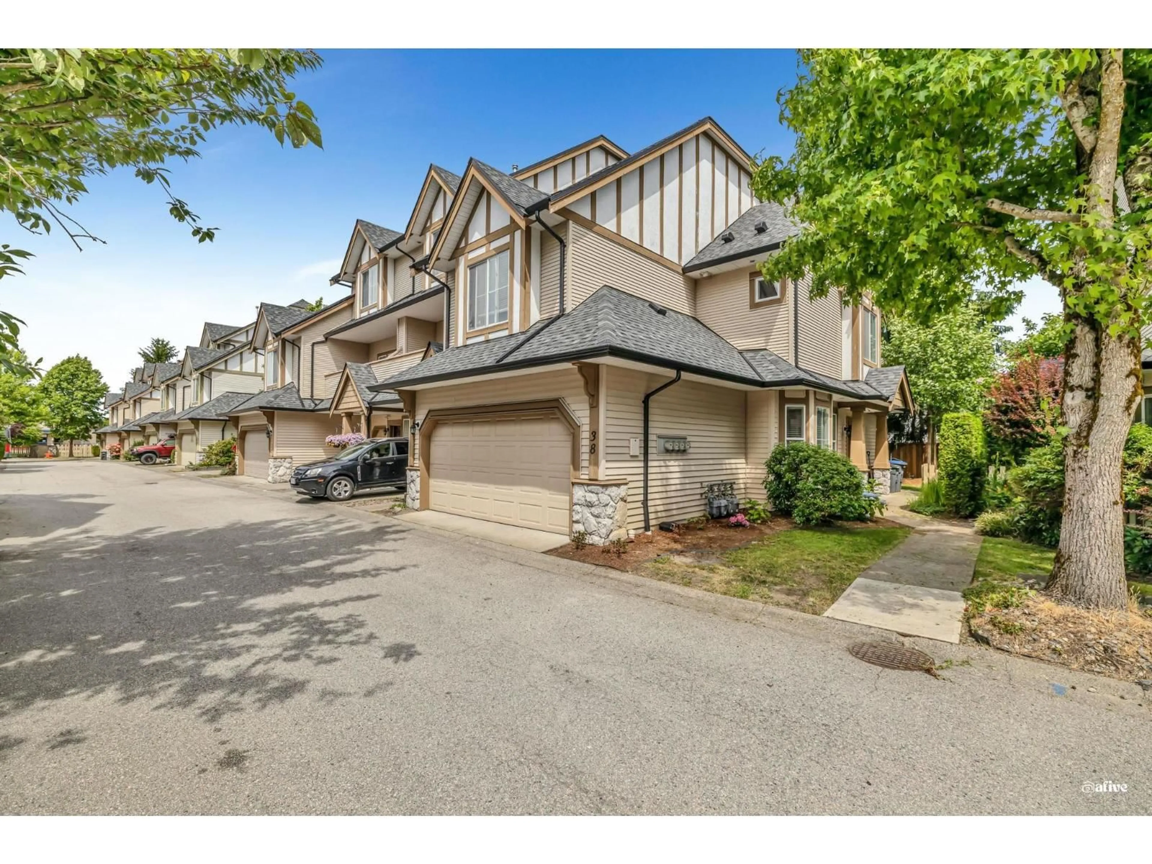 A pic from outside/outdoor area/front of a property/back of a property/a pic from drone, street for 38 - 18707 65, Surrey British Columbia V3S9H2