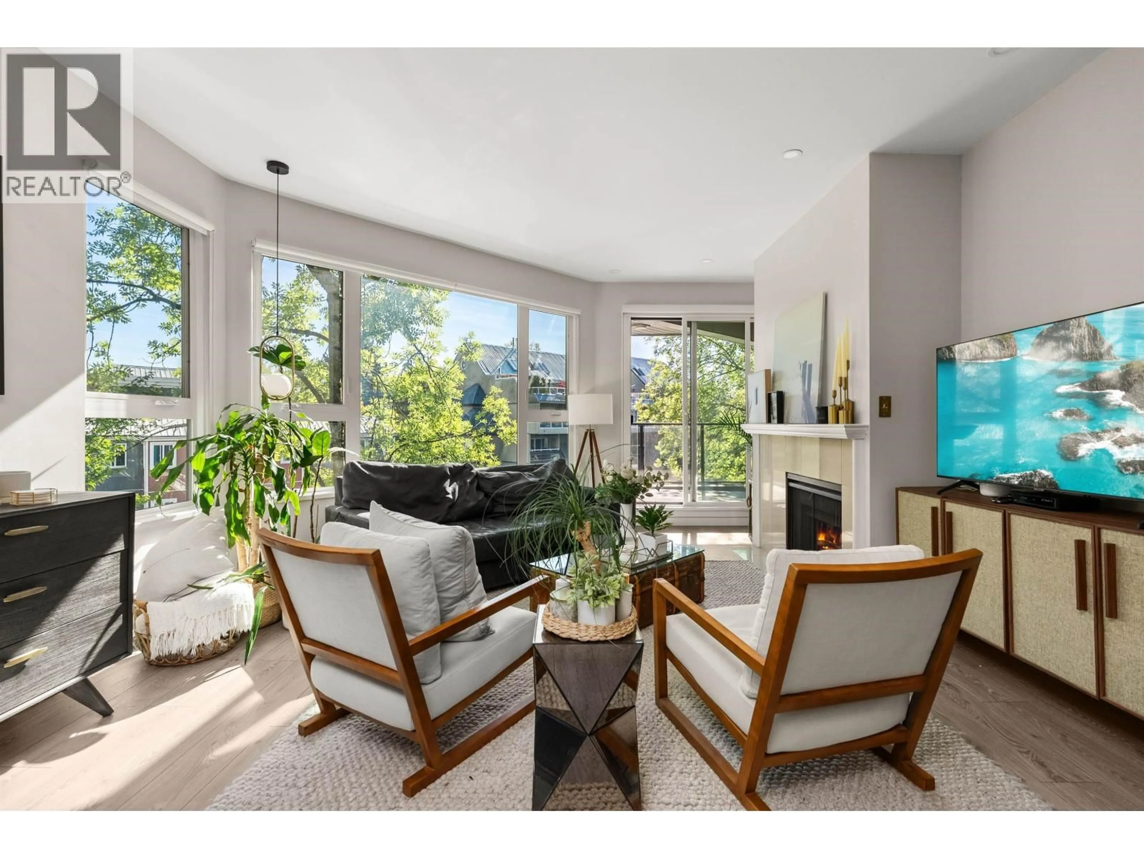 Living room with furniture, unknown for 301 - 1150 QUAYSIDE DRIVE, New Westminster British Columbia V3M6E1