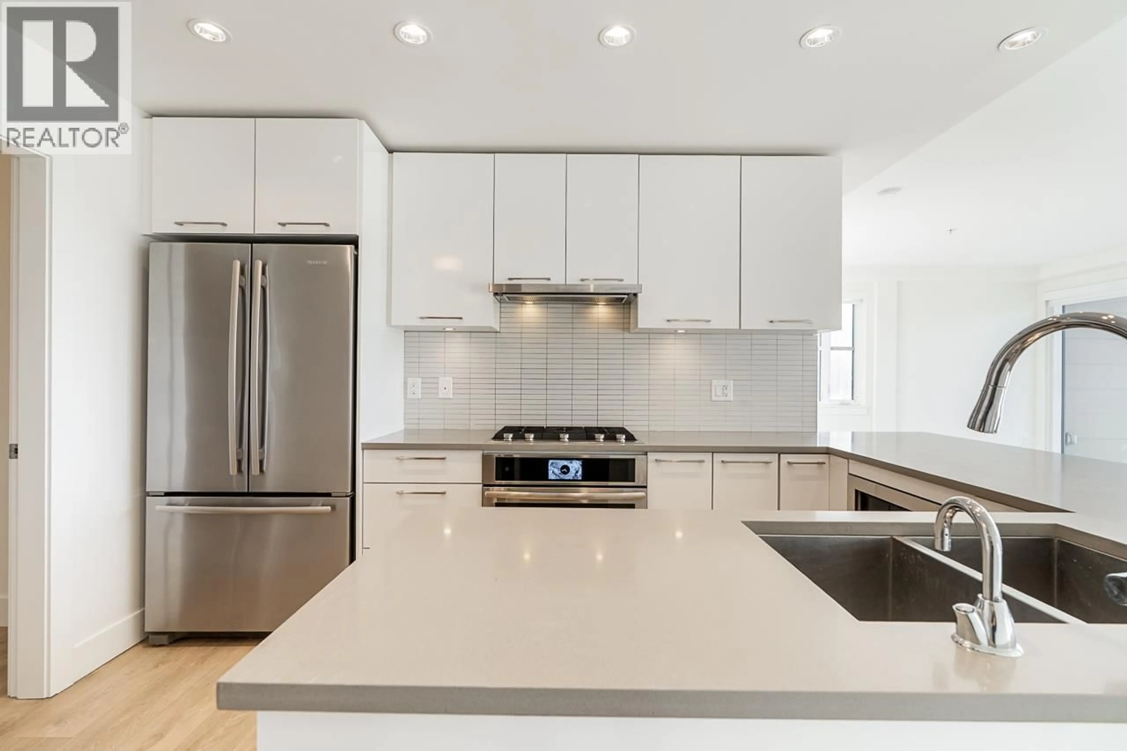 Contemporary kitchen, ceramic/tile floor for 515 - 3488 SAWMILL CRESCENT, Vancouver British Columbia V5S0C7