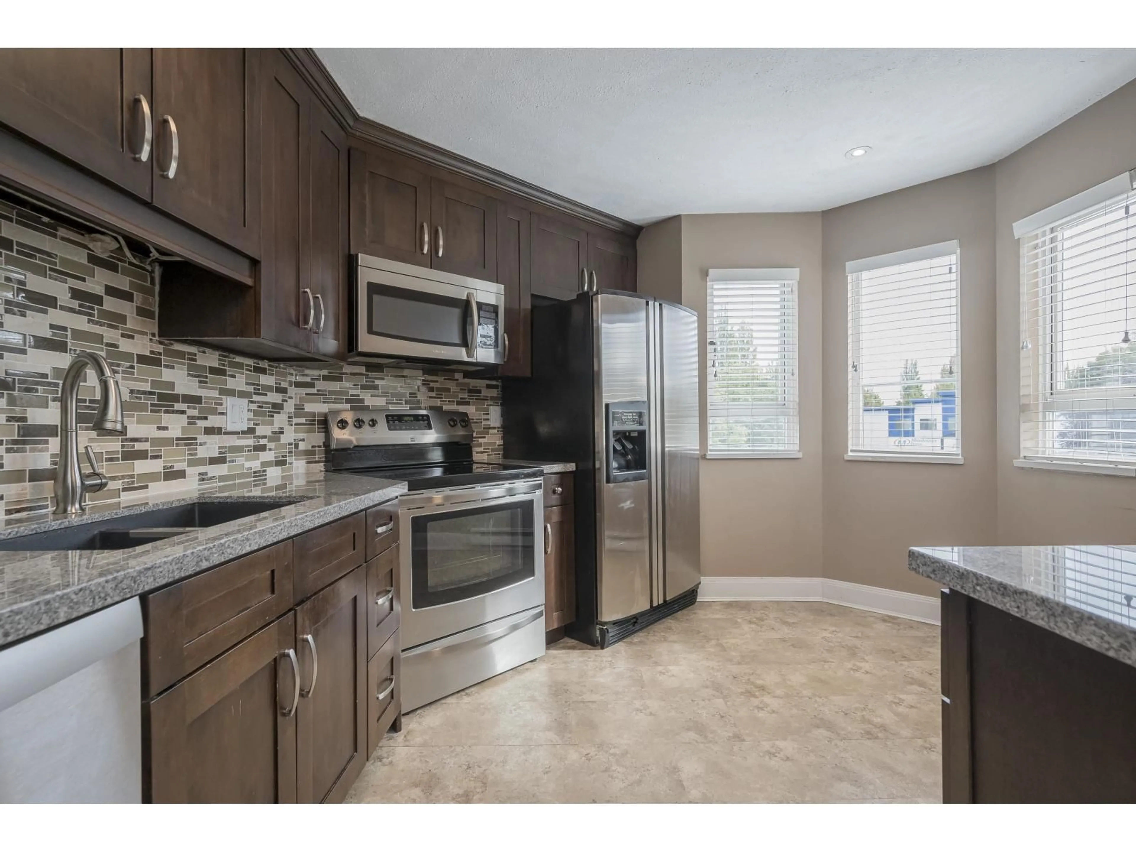 Standard kitchen, ceramic/tile floor for 217 - 5765 GLOVER, Langley British Columbia V3A8M8