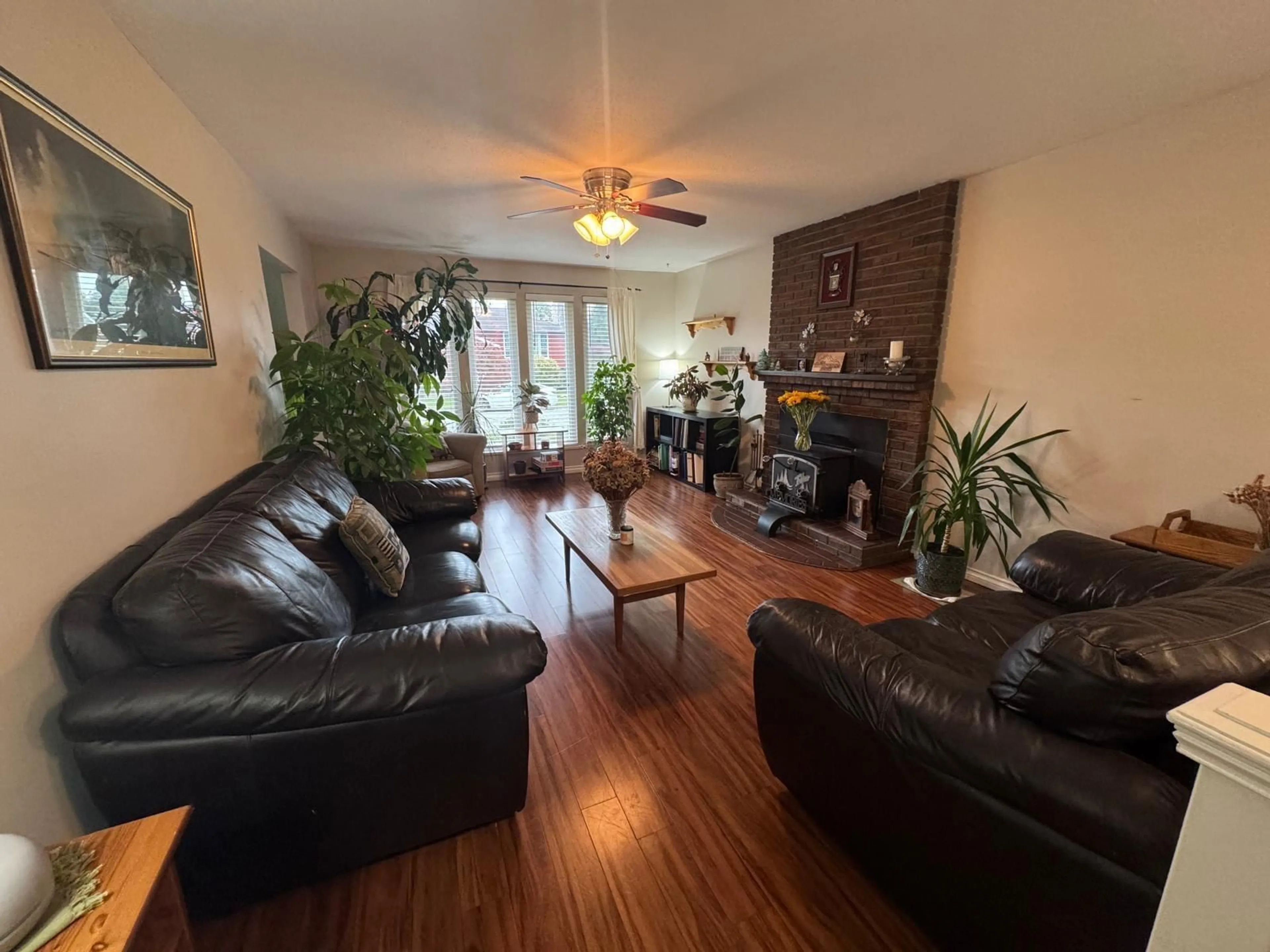 Living room with furniture, wood/laminate floor for 35183 EWERT, Mission British Columbia V2V6S7