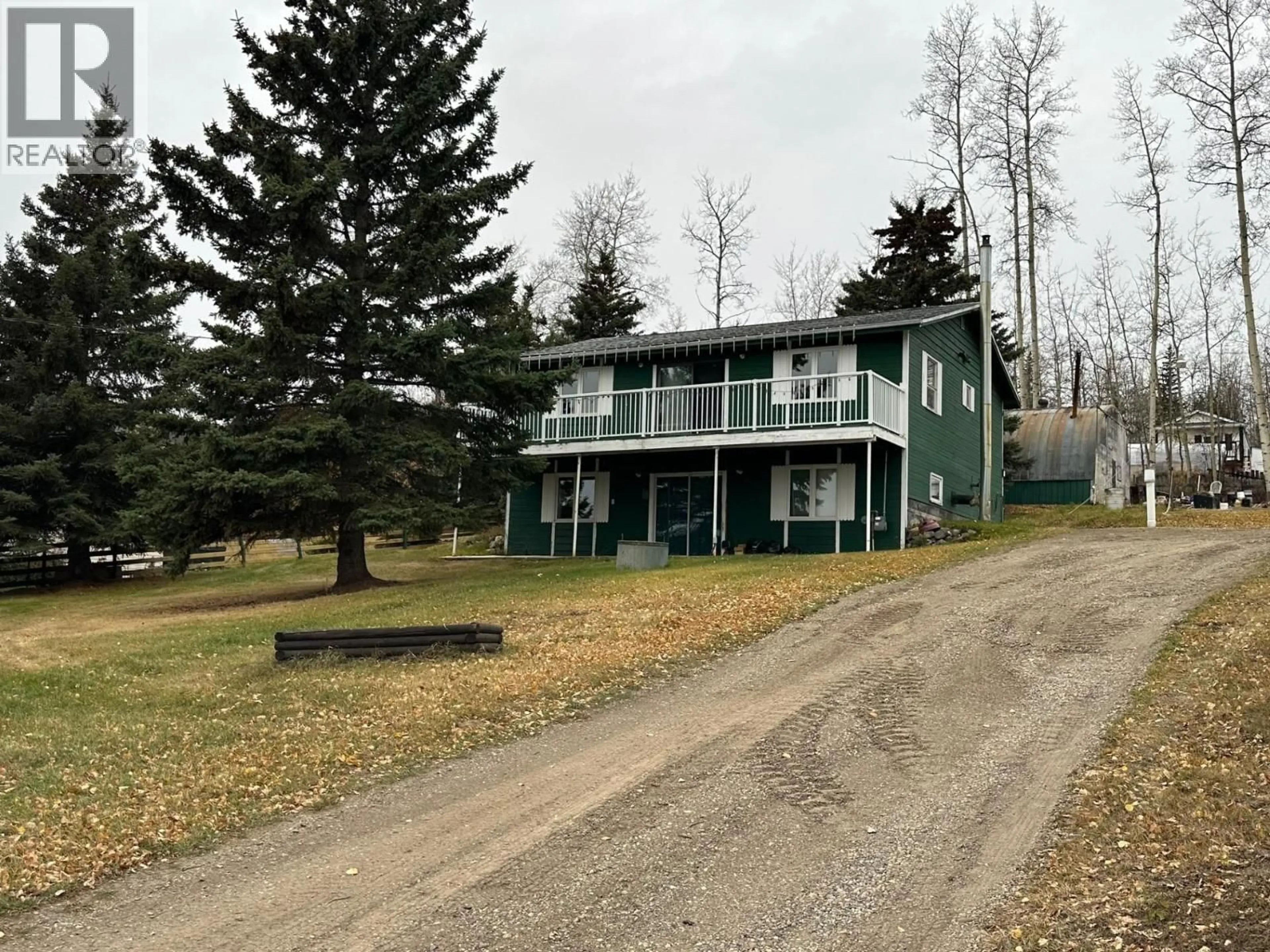 A pic from outside/outdoor area/front of a property/back of a property/a pic from drone, unknown for 13235 LAKE SHORE DRIVE, Charlie Lake British Columbia V1J8G1
