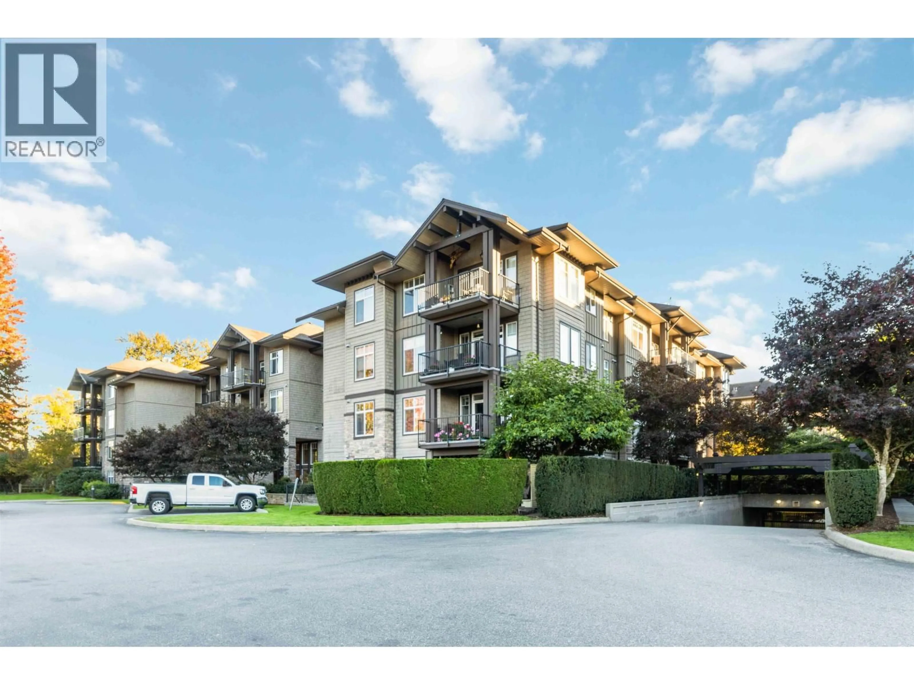 A pic from outside/outdoor area/front of a property/back of a property/a pic from drone, mountain view for 305 - 12268 224 STREET, Maple Ridge British Columbia V2X6B8
