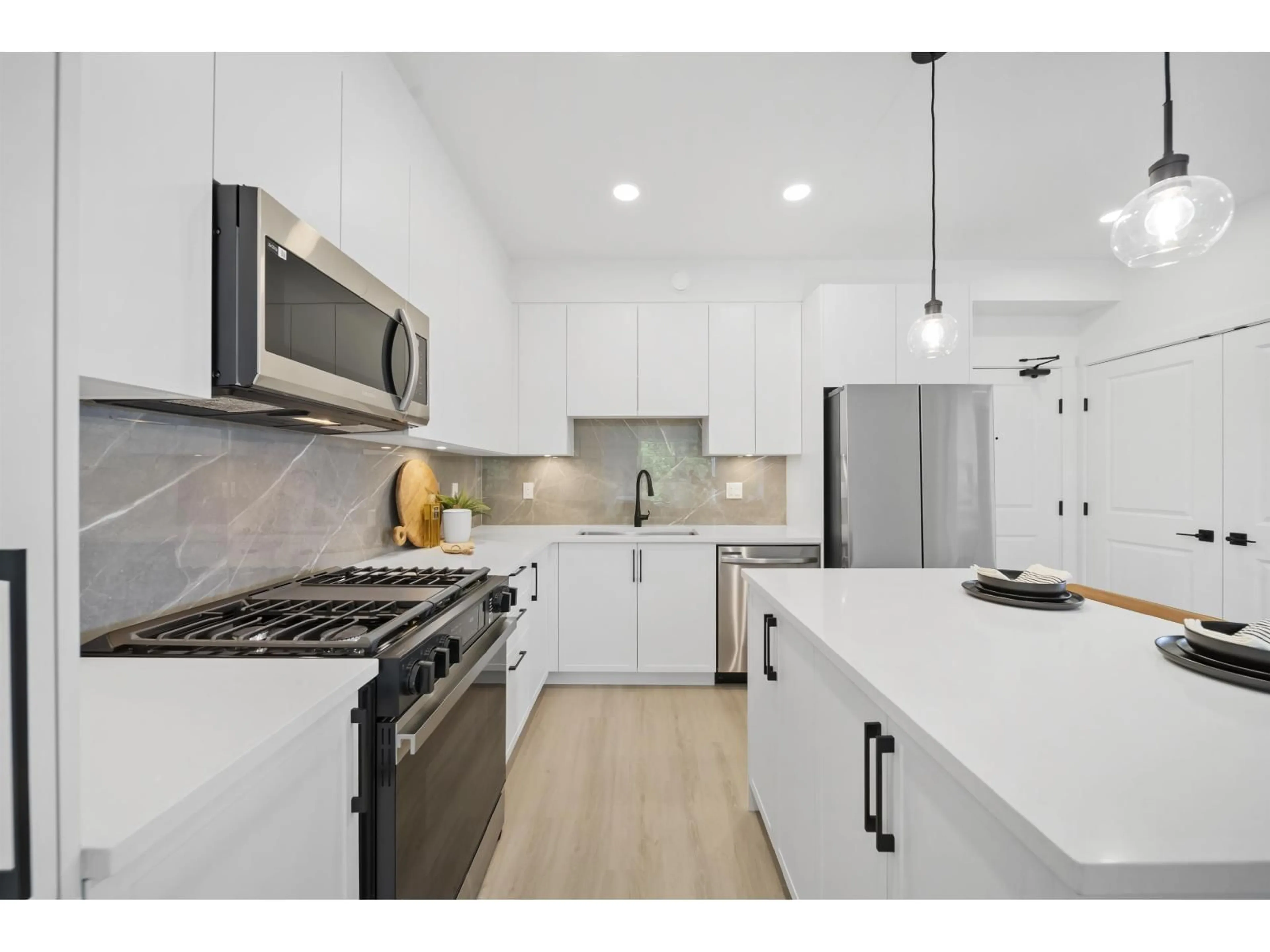 Open concept kitchen, unknown for 406 - 3465 146A, Surrey British Columbia V0V0V0