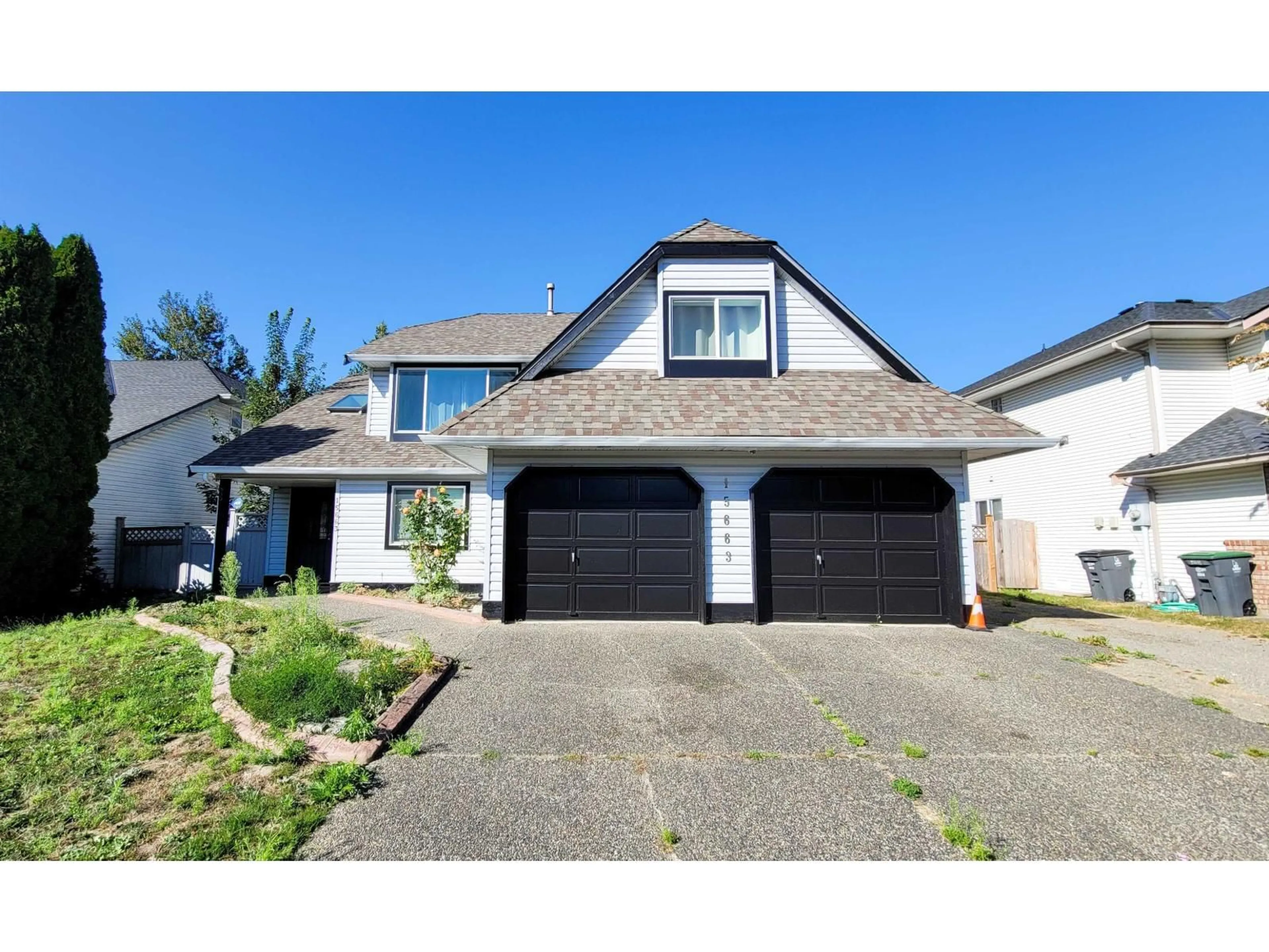 Home with vinyl exterior material, street for 15663 107A, Surrey British Columbia V4N3H9