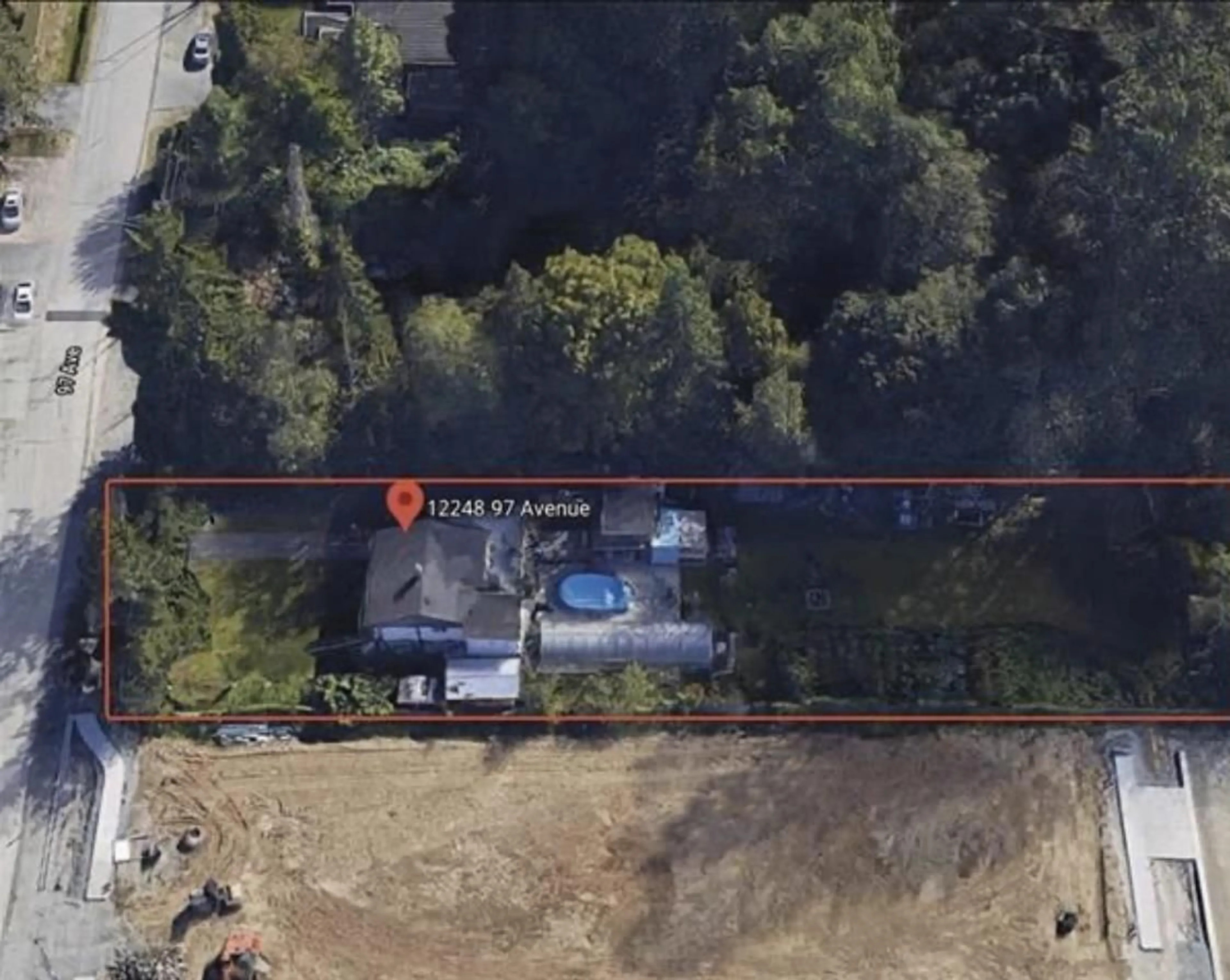A pic from outside/outdoor area/front of a property/back of a property/a pic from drone, unknown for 12248 97, Surrey British Columbia V3V2C9