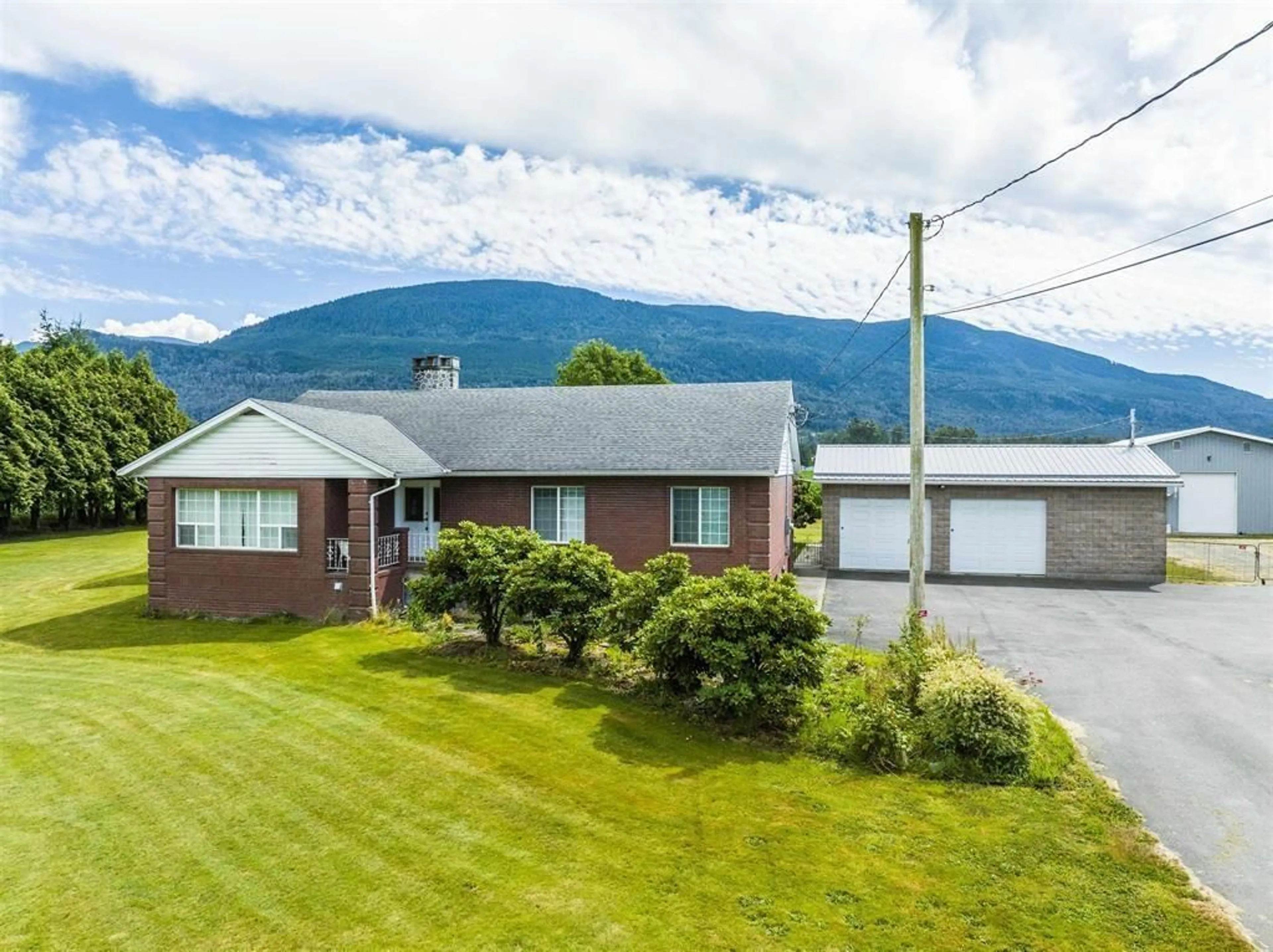 A pic from outside/outdoor area/front of a property/back of a property/a pic from drone, mountain view for 42832 KEITH WILSON ROAD, Chilliwack British Columbia V2R4B3