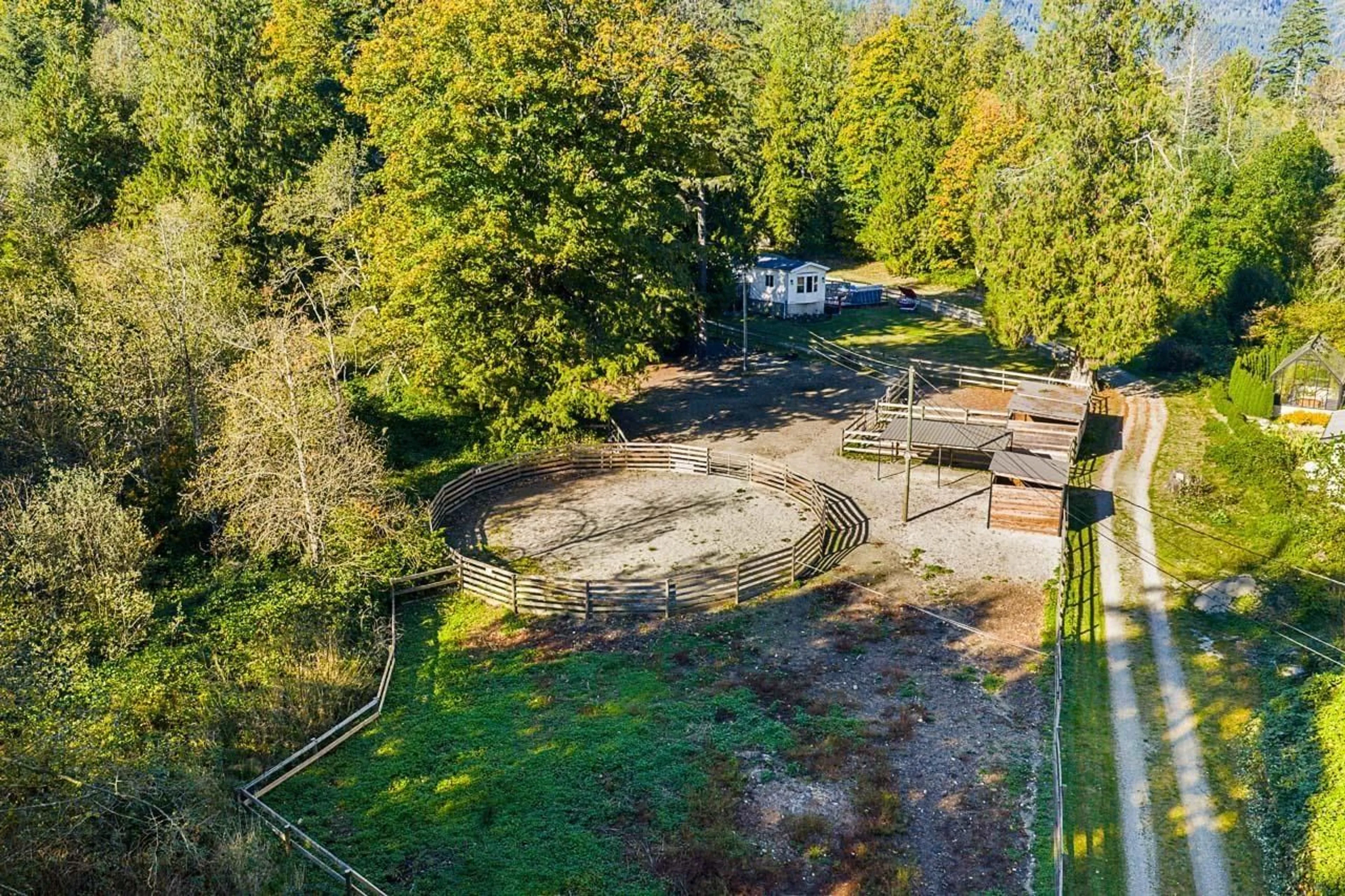 A pic from outside/outdoor area/front of a property/back of a property/a pic from drone, forest/trees view for 43699 OHMAN, Mission British Columbia V0M1N0