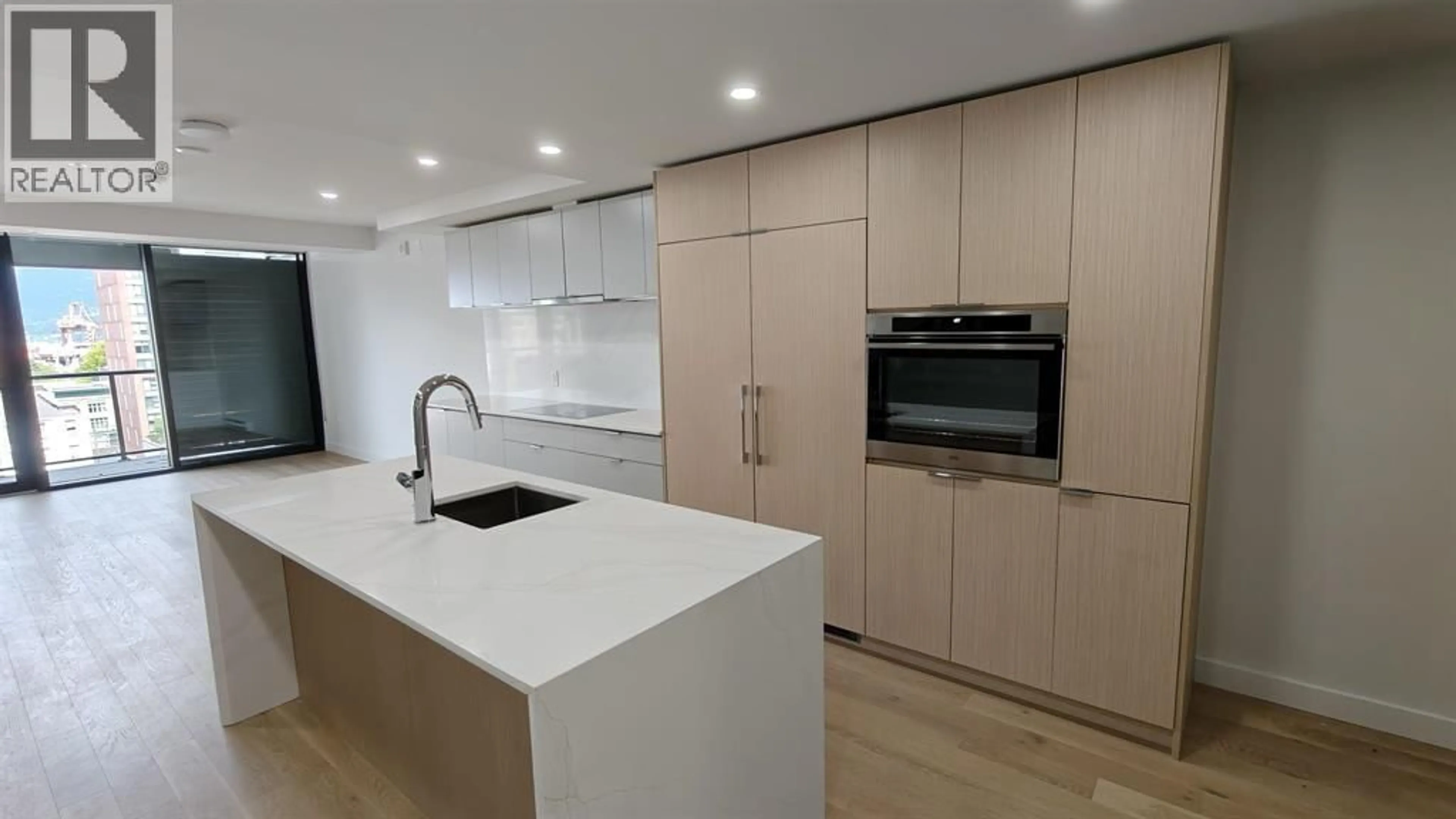 Open concept kitchen, wood/laminate floor for 901 - 239 KEEFER STREET, Vancouver British Columbia V6A1X6