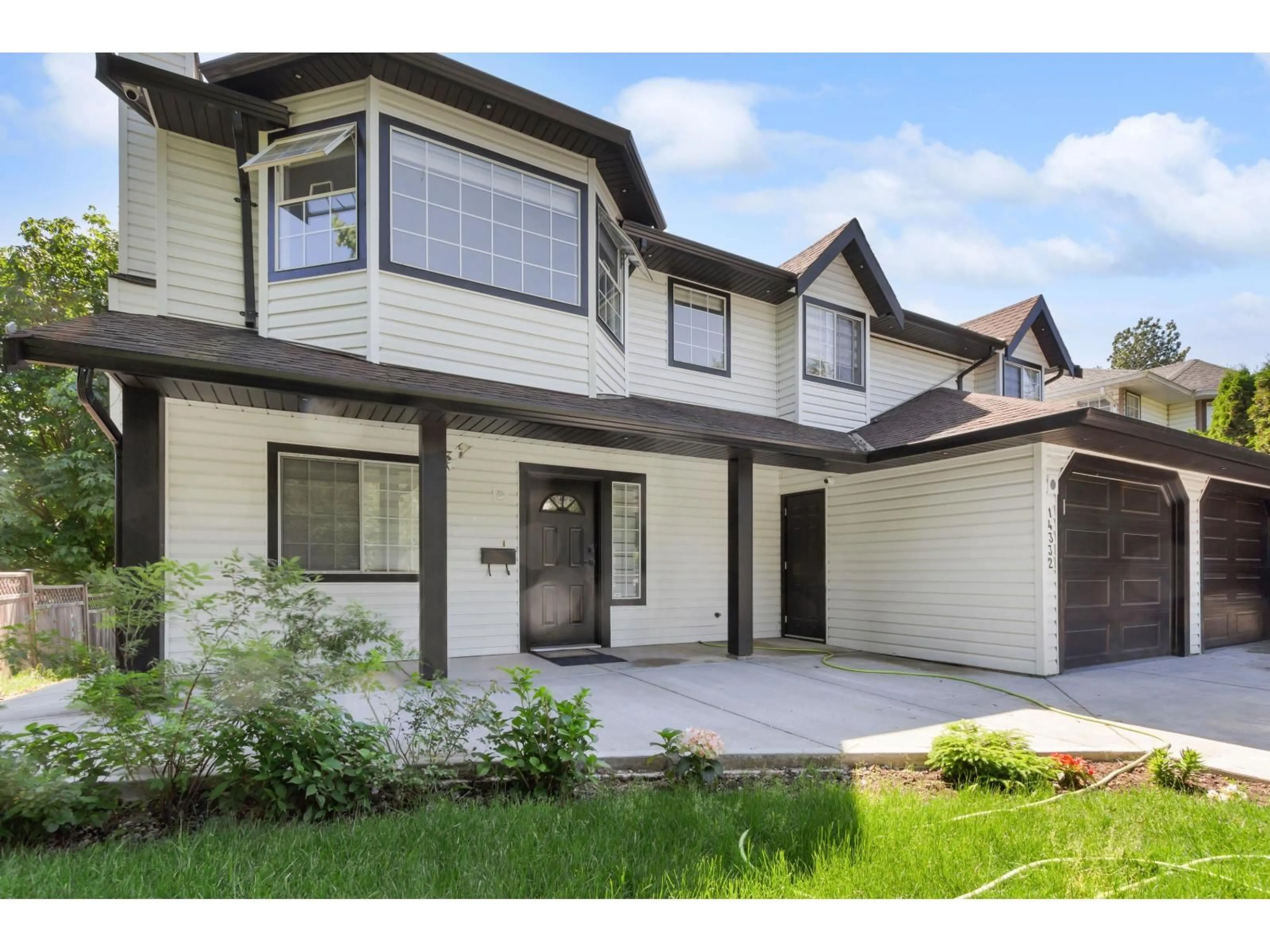 Home with vinyl exterior material, street for 14332 HYLAND, Surrey British Columbia V3W2C5