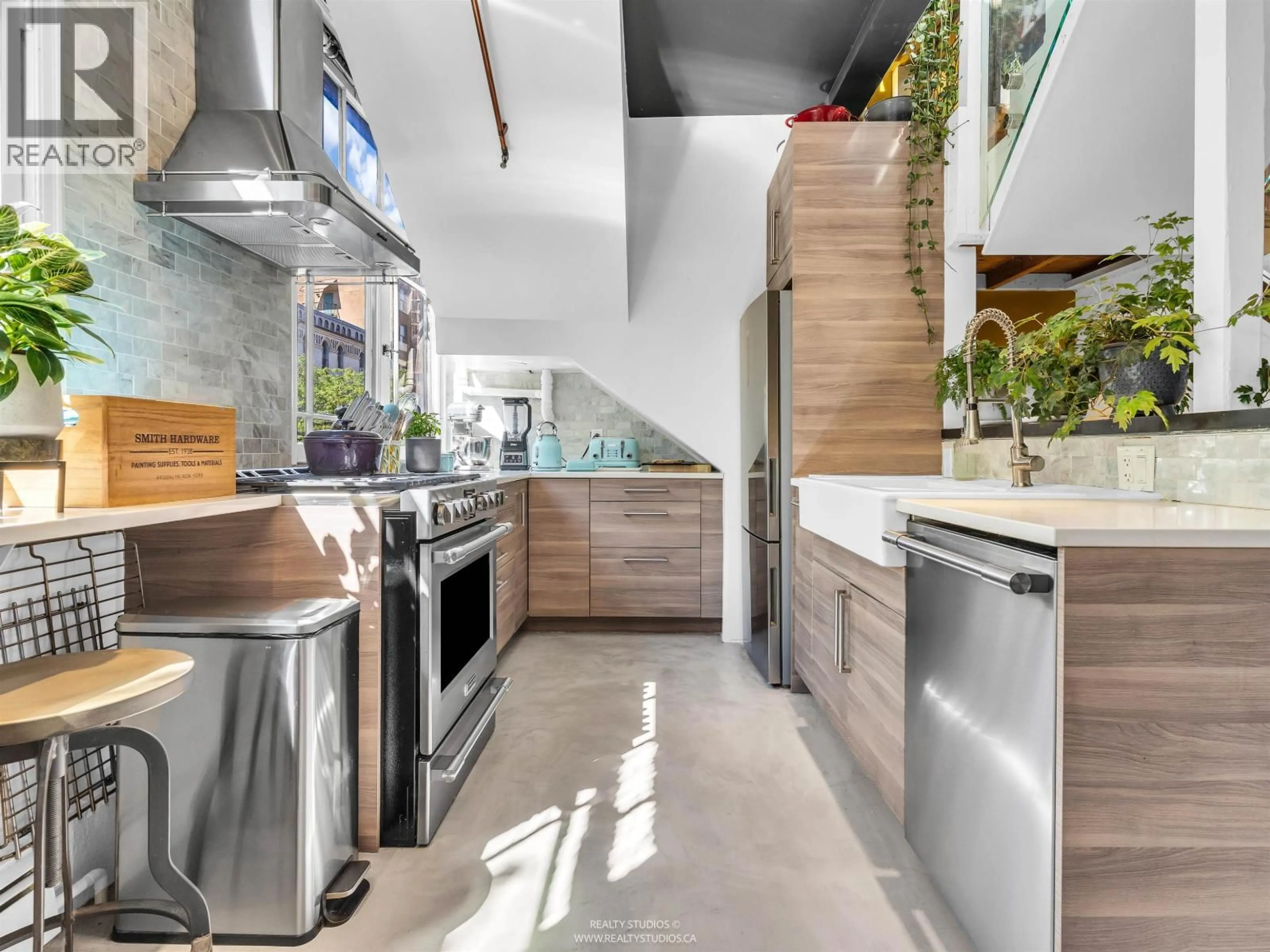 Contemporary kitchen, ceramic/tile floor for 83 ALEXANDER STREET, Vancouver British Columbia V6A1B2
