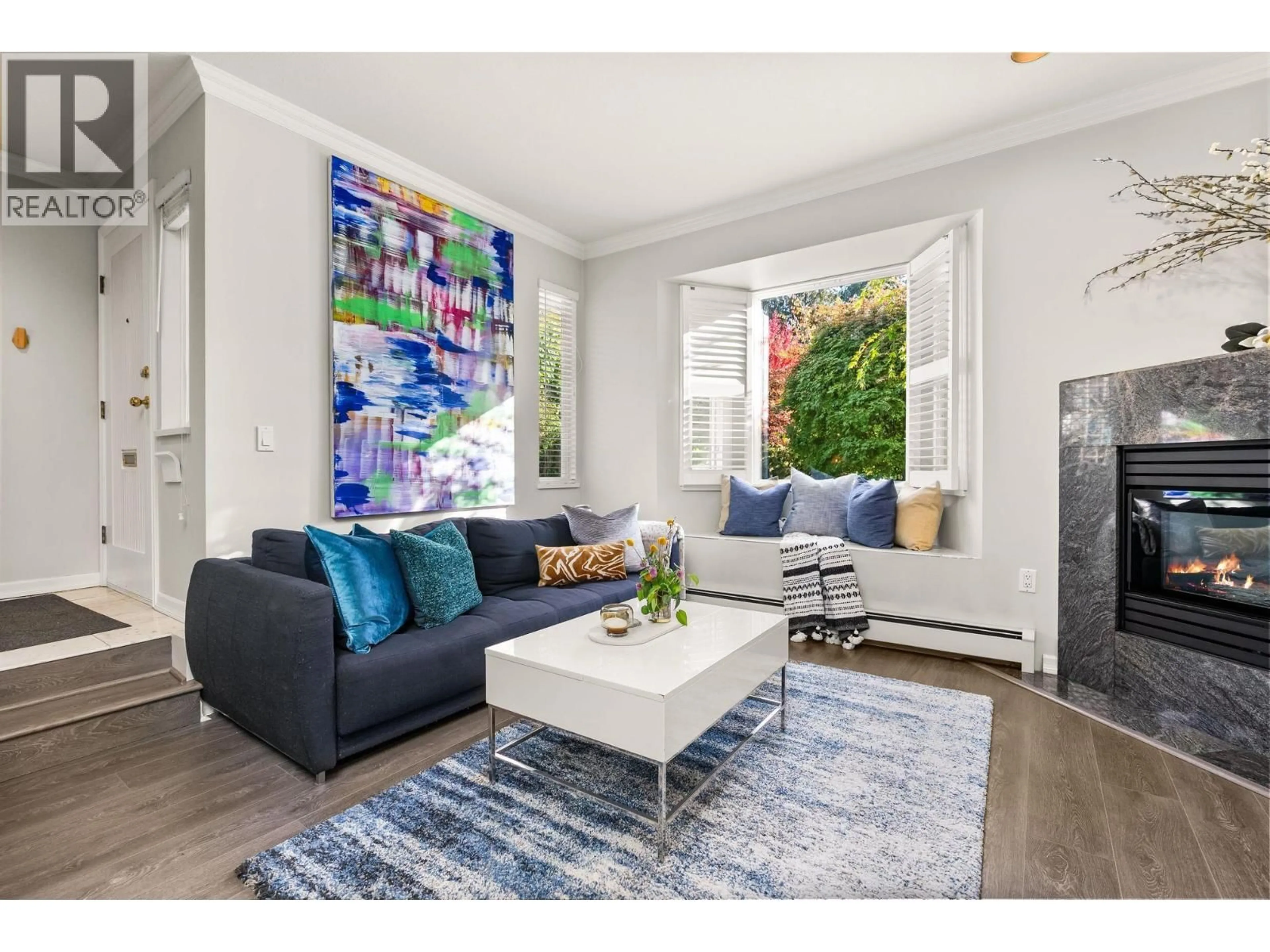 Living room with furniture, wood/laminate floor for 346 14TH STREET, North Vancouver British Columbia V7M1P6