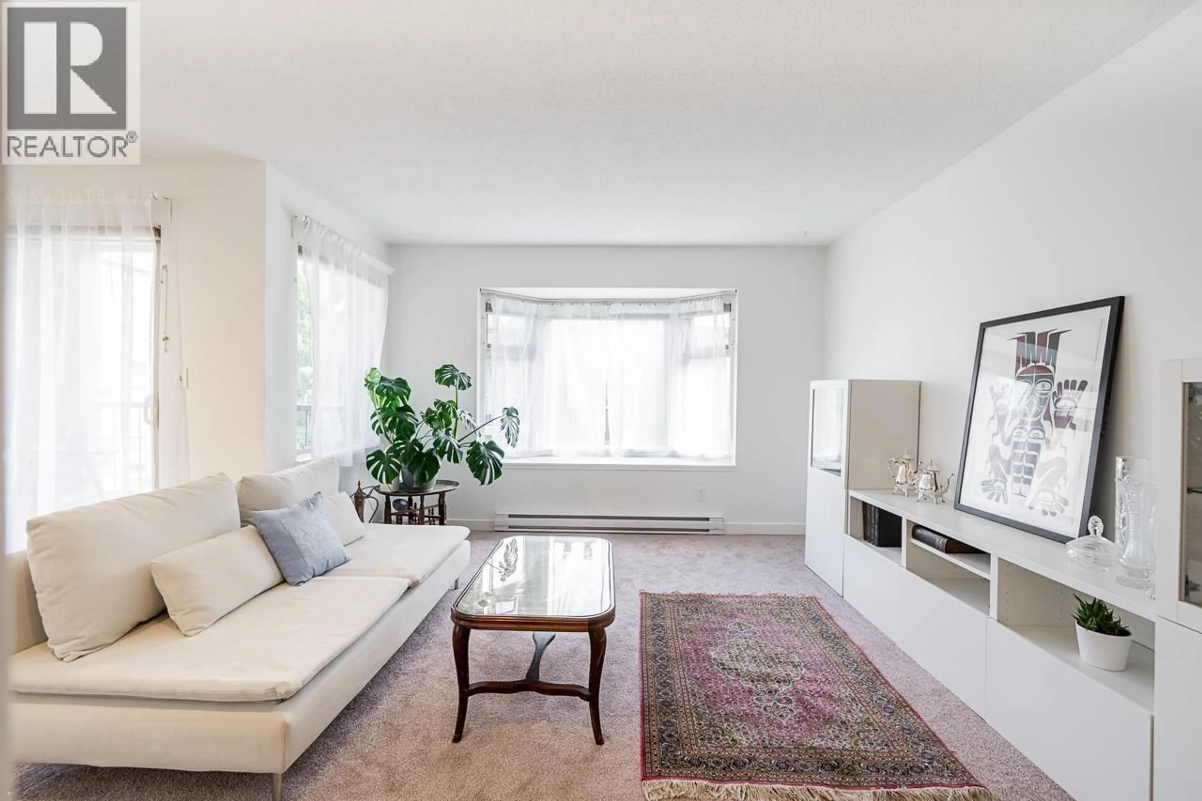 Living room with furniture, carpet floor for 306 - 737 HAMILTON STREET, New Westminster British Columbia V3M2M7