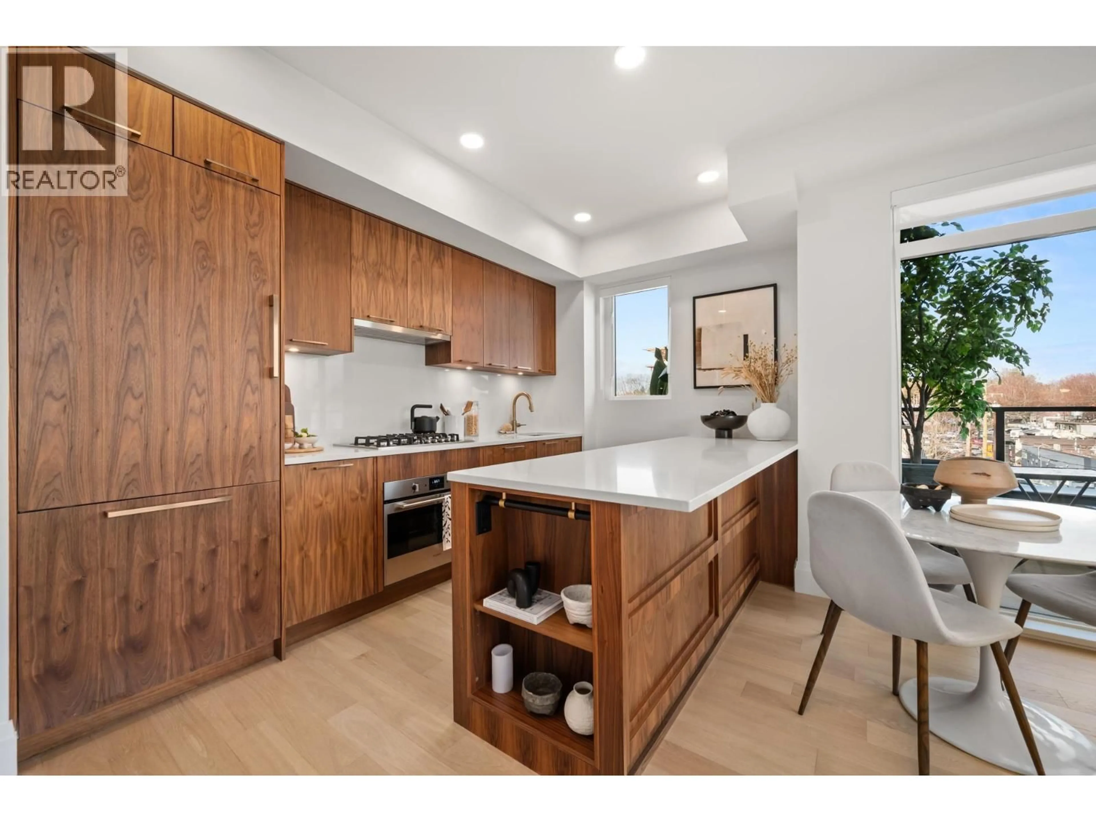 Open concept kitchen, unknown for 313 - 2550 GARDEN DRIVE, Vancouver British Columbia V5N4X6